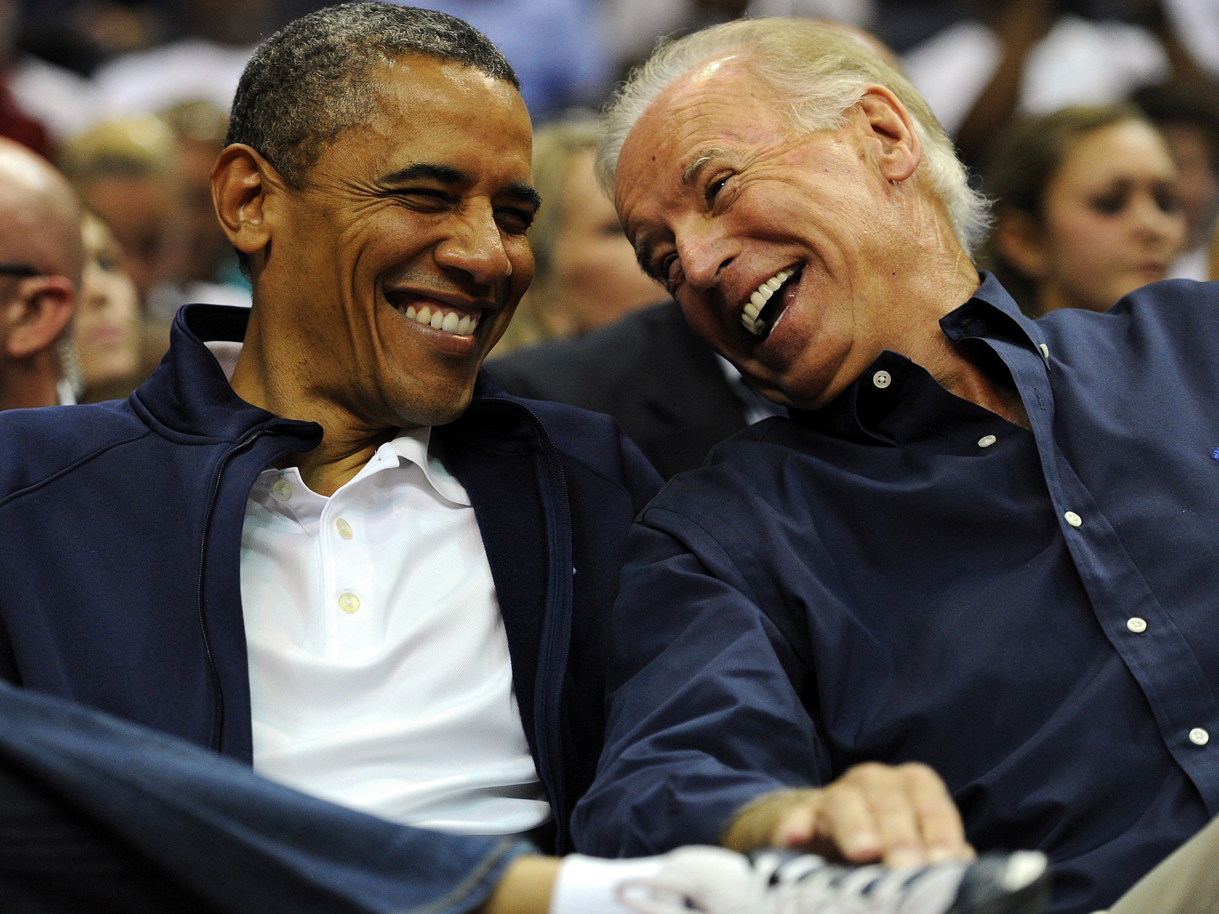 President Obama and Vice President Biden watch a basketball game in July 2012 in Washington, D.C.