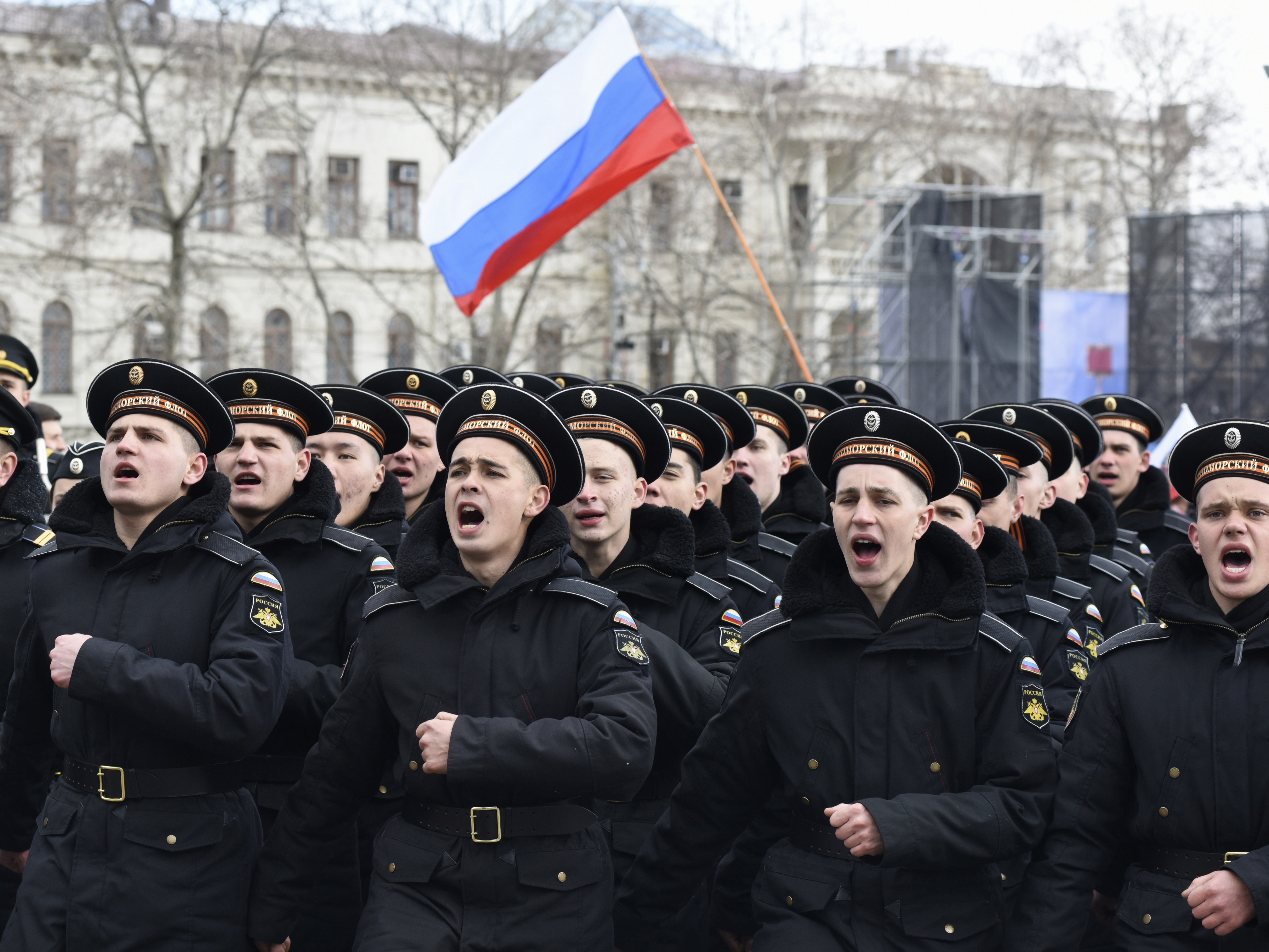 Russian Black Sea fleet sailors shout as they march in Sevastopol, Crimea, during a military parade last year marking the anniversary of the annexation of the Crimean Peninsula from Ukraine.