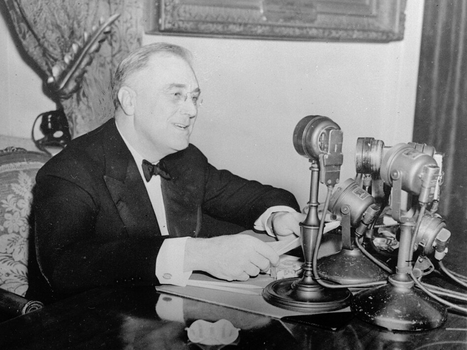 President Franklin D. Roosevelt talks to the nation in a fireside chat from the White House in this November 1937 photo. (Associated Press)