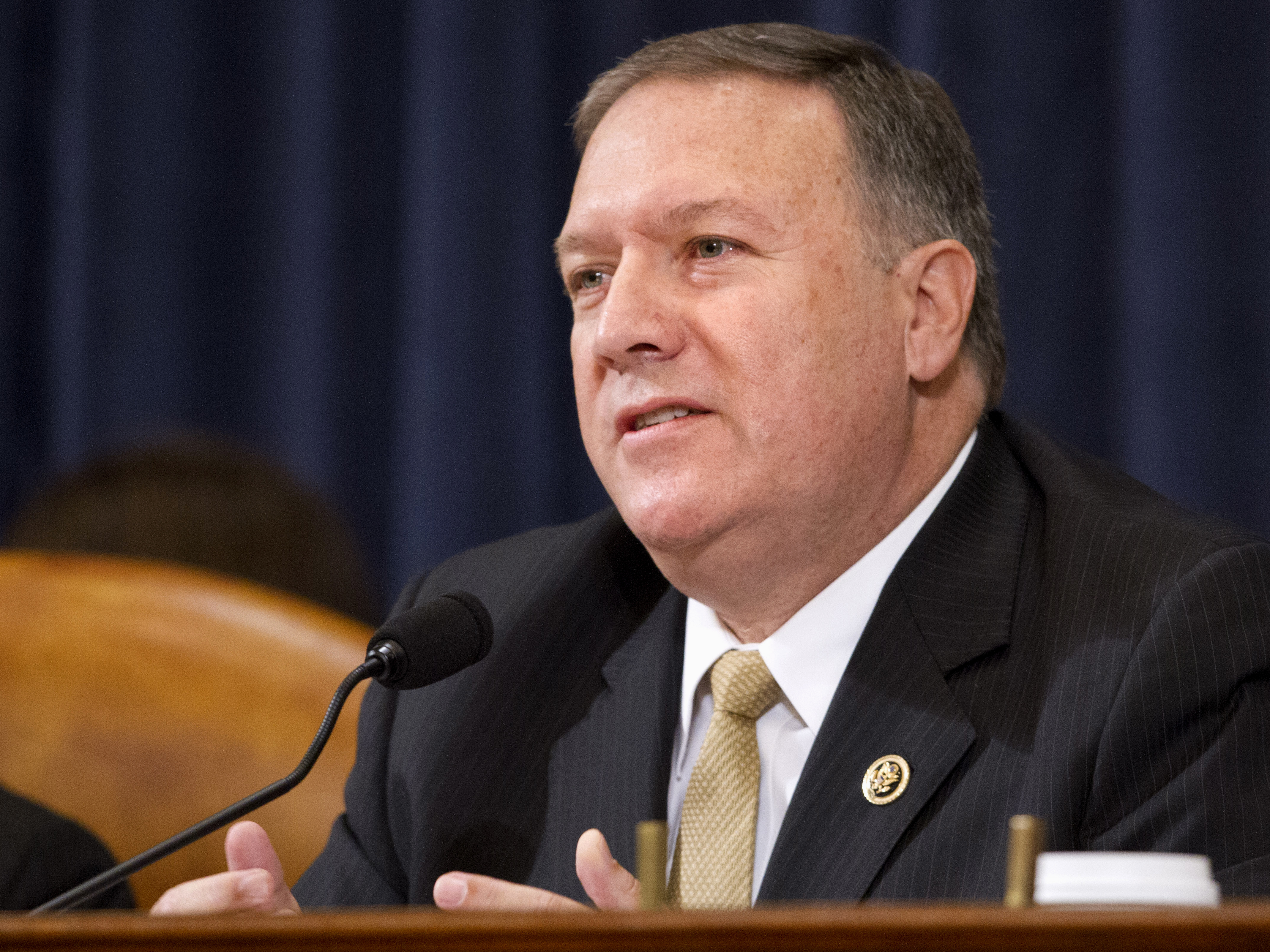 House Committee on Benghazi member Rep. Mike Pompeo, R-Kan., questions then-Democratic presidential candidate Hillary Clinton, during a hearing in October 2015.