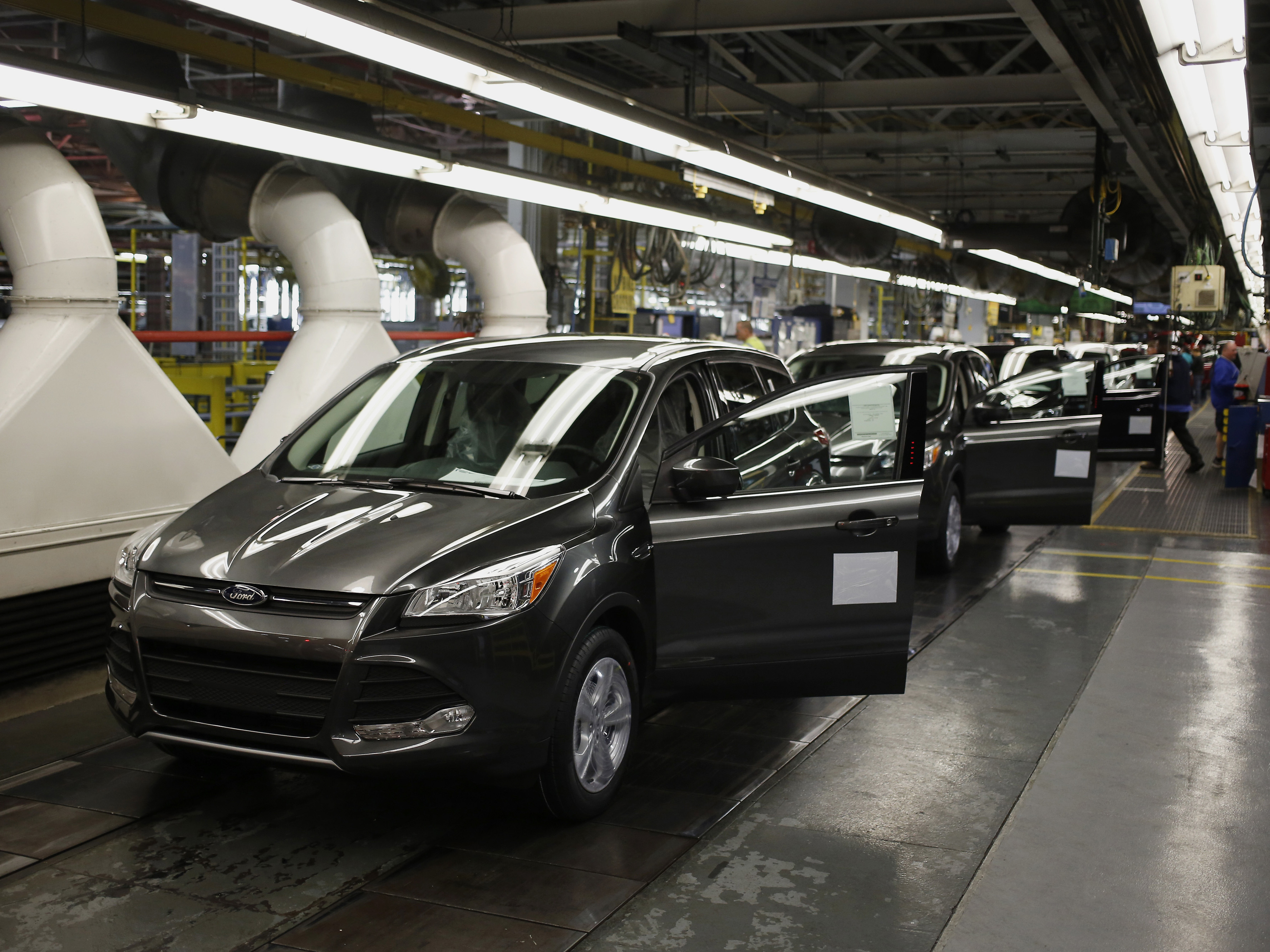 Ford Escape sport utility vehicles move down the production line at Ford Motor Co.'s Louisville Assembly Plant in Kentucky.