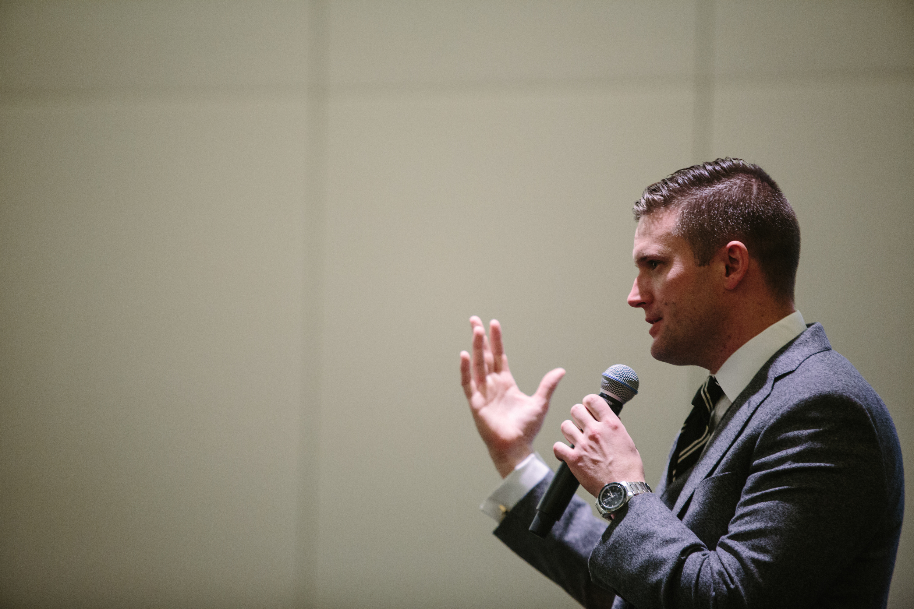 Richard Spencer addresses a room of press and conference attendees at a news conference held by the National Policy Institute during its &quot;Become Who We Are&quot; event in Washington, D.C. Prior to the news conference, which was held in the same room as the broader NPI event, Spencer told journalists they could not take photos of the room because attendees could be identified without their permission. (NPR)