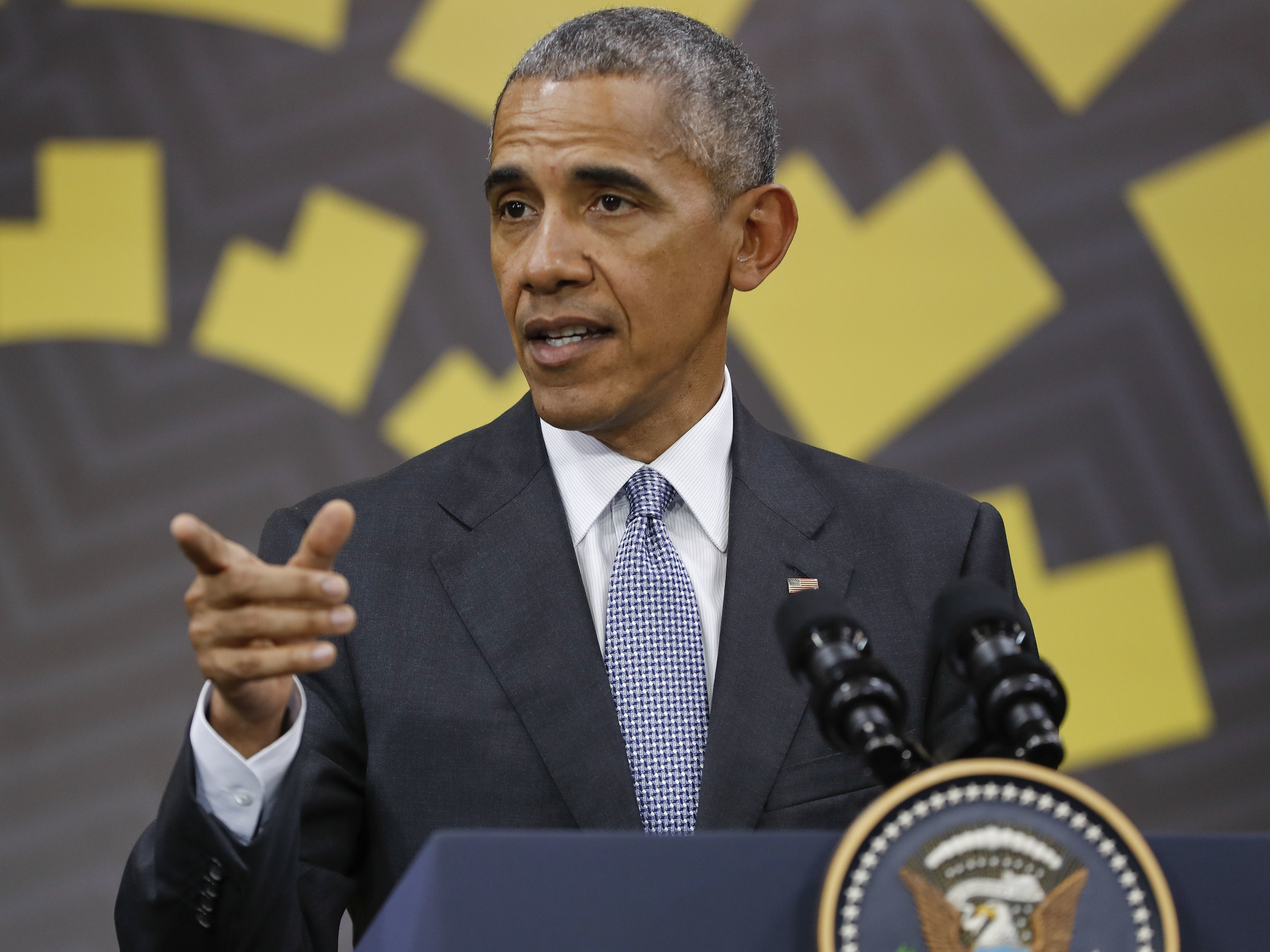 President Obama answers questions during a news conference at the Asia-Pacific Economic Cooperation in Lima, Peru, on Sunday.
