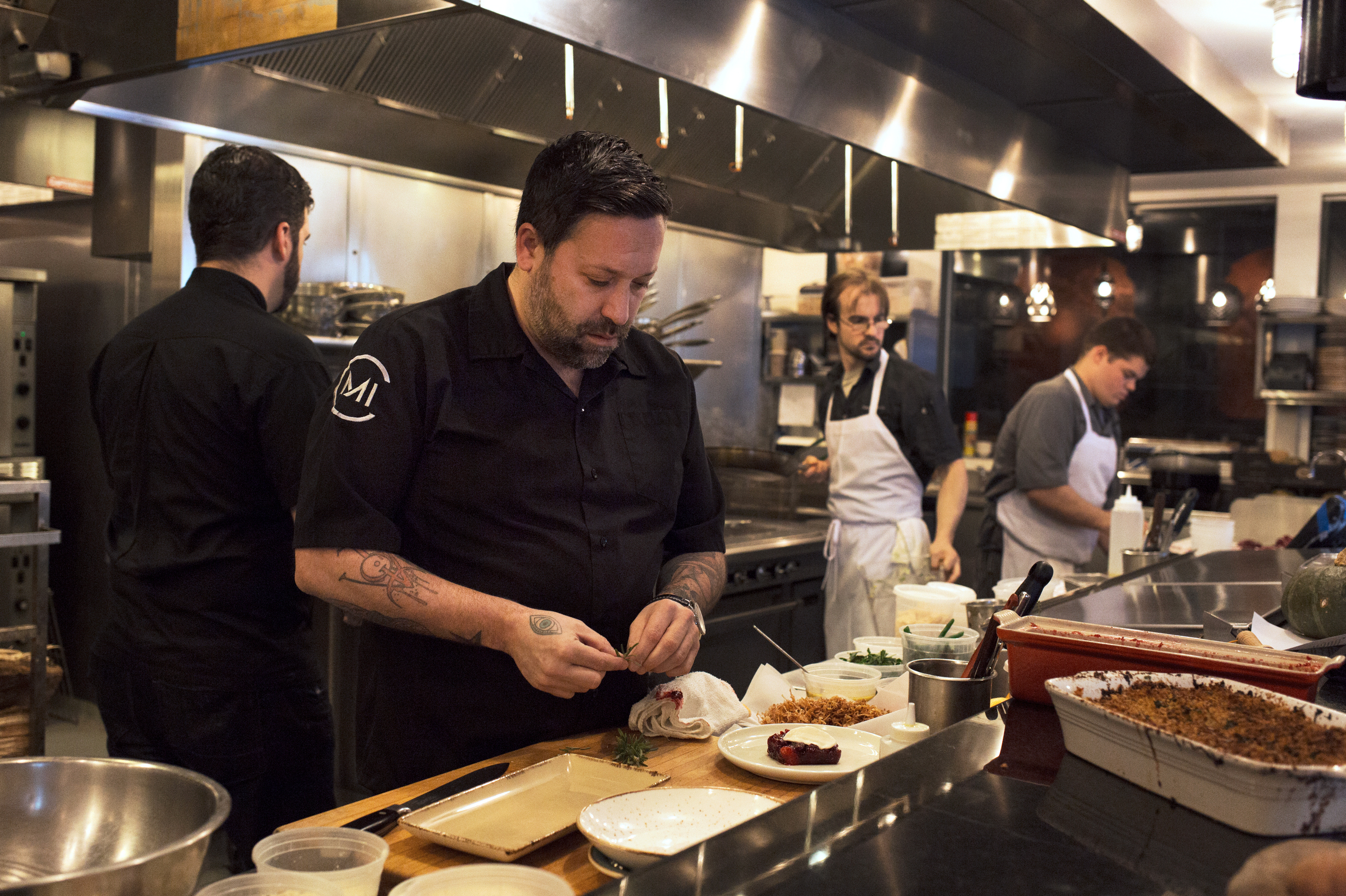 Chef Mike Isabella creates alternatives to traditional Thanksgiving dishes at Kapnos restaurant in Washington, D.C. (NPR)