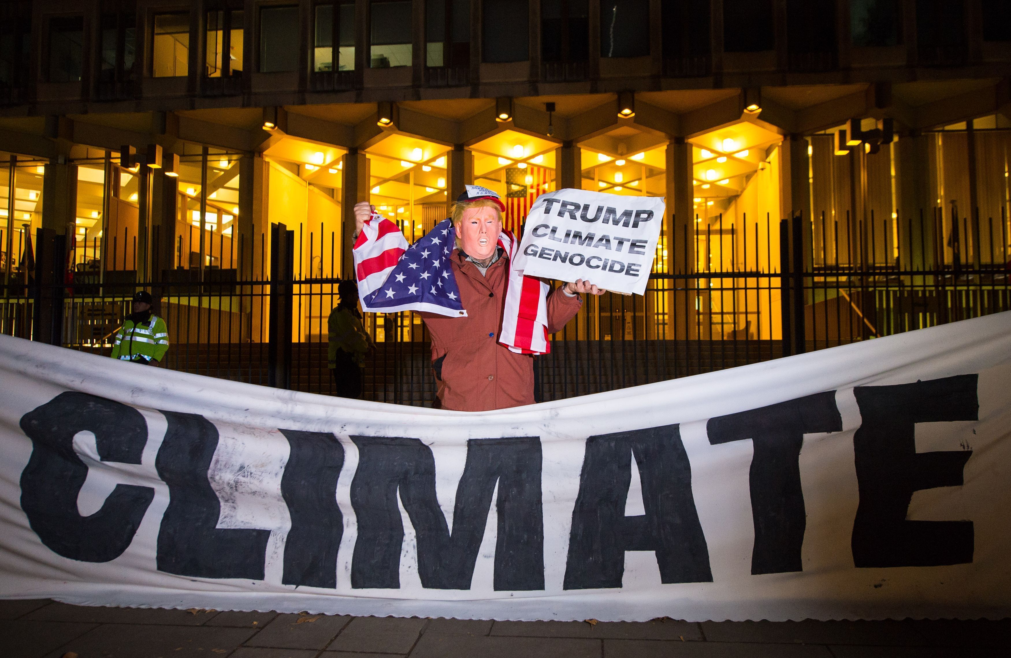 A protester dressed as Donald Trump demonstrates outside the U.S. Embassy in London. (PA Images via Getty Images)