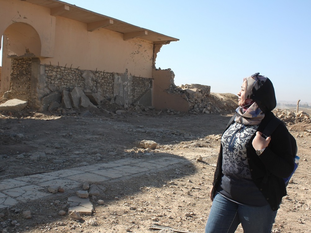 Archaeologist Layla Salih looks around the ancient site of Nimrud, in northern Iraq, outside Mosul. The Islamic State captured the area in 2014 and destroyed many of its archaeological treasures that date back 3,000 years. The extremist group was recently driven out of Nimrud, allowing Salih and others to come back and survey the extensive damage. (NPR)