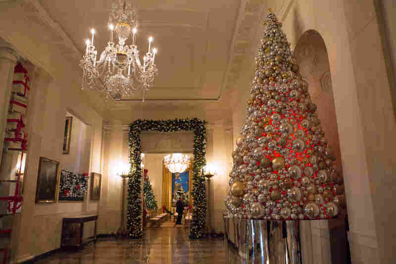 The Grand Foyer is decorated with shiny presents and mirrored ornaments to fit its theme of hope and gratitude, "The Gift of Reflection."