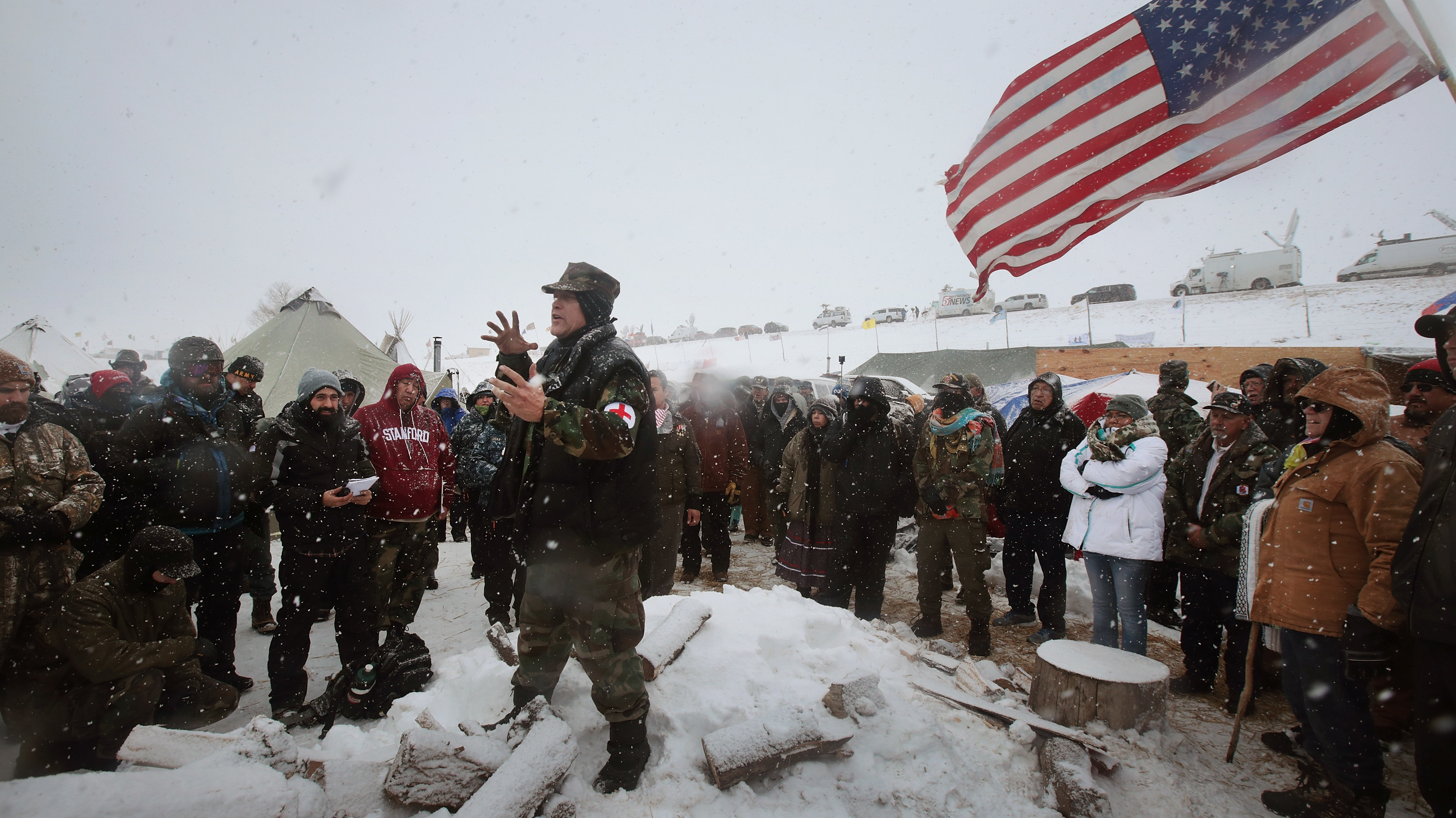 Military veterans are briefed on their role at Oceti Sakowin Camp and on cold-weather safety on Monday. Over the weekend, a group of veterans joined activists who have been trying to halt the construction of the Dakota Access Pipeline. Scott Olson/Getty Images