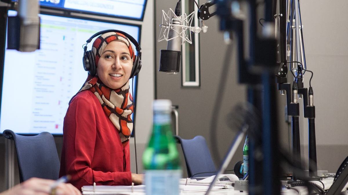 NPR reporter Asma Khalid during a live broadcast. She covered demographics and the 2016 campaign. (NPR)
