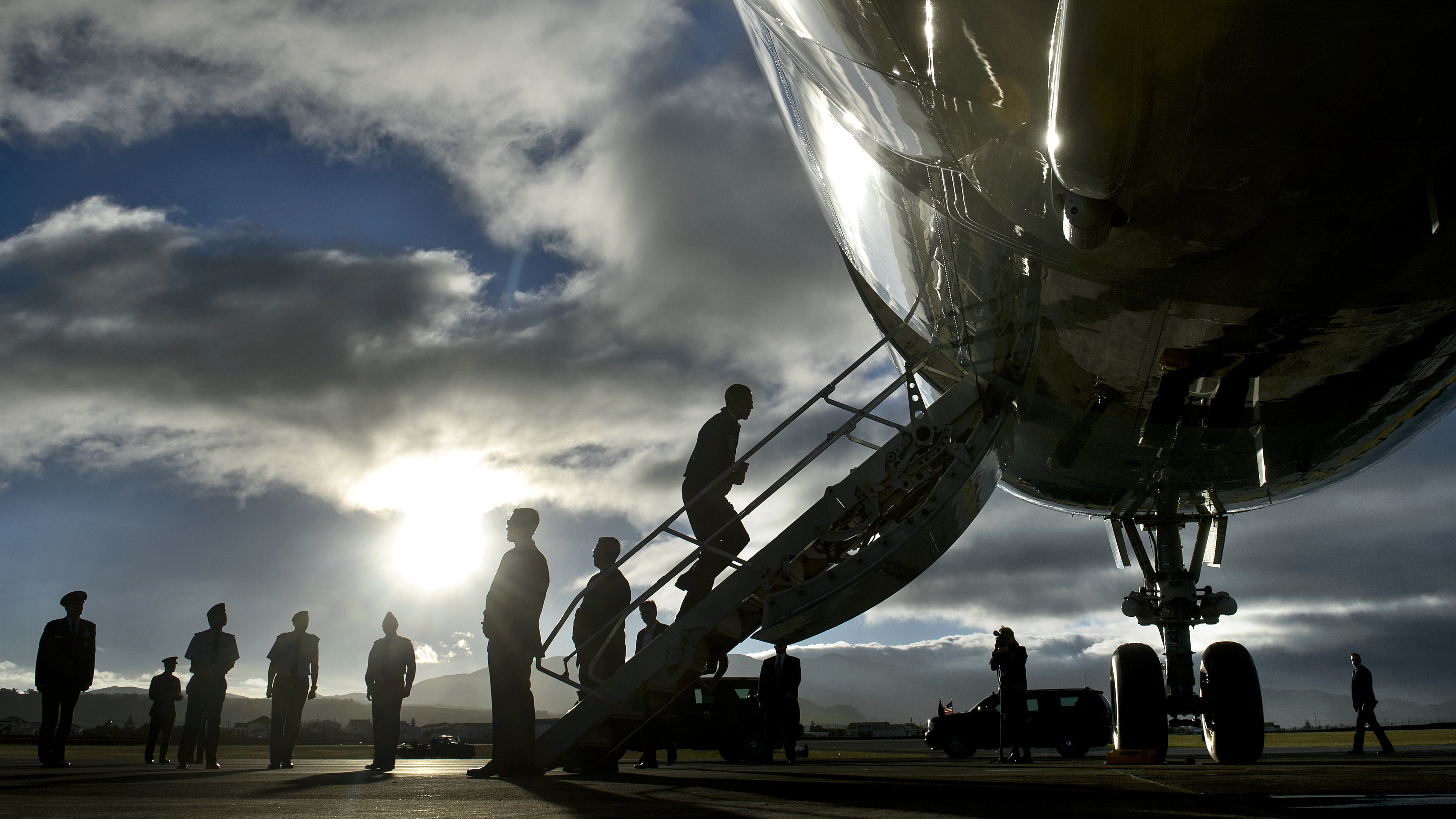 President Obama boards Air Force One during a refueling stop Nov. 18 in the Portuguese islands of Azores. (AFP/Getty Images)