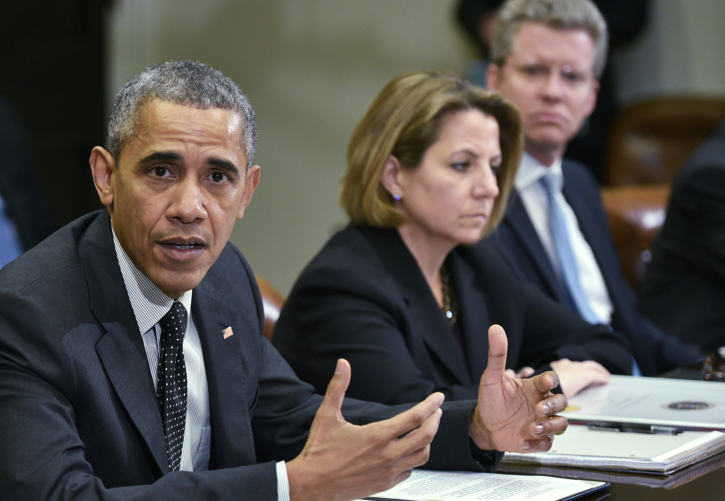 President Obama meets with members of his national security team and cybersecurity advisers in February. Homeland security adviser Lisa Monaco and Office of Management and Budget Director Shaun Donovan are at right. (AFP/Getty Images)