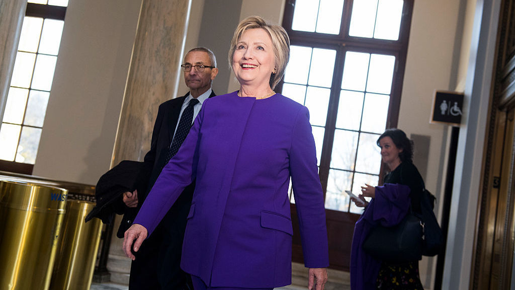 Former Secretary of State Hillary Clinton and John Podesta arrive for a portrait unveiling ceremony for retiring Senate Minority Leader Harry Reid, D-Nev., last week. (CQ-Roll Call,Inc.)