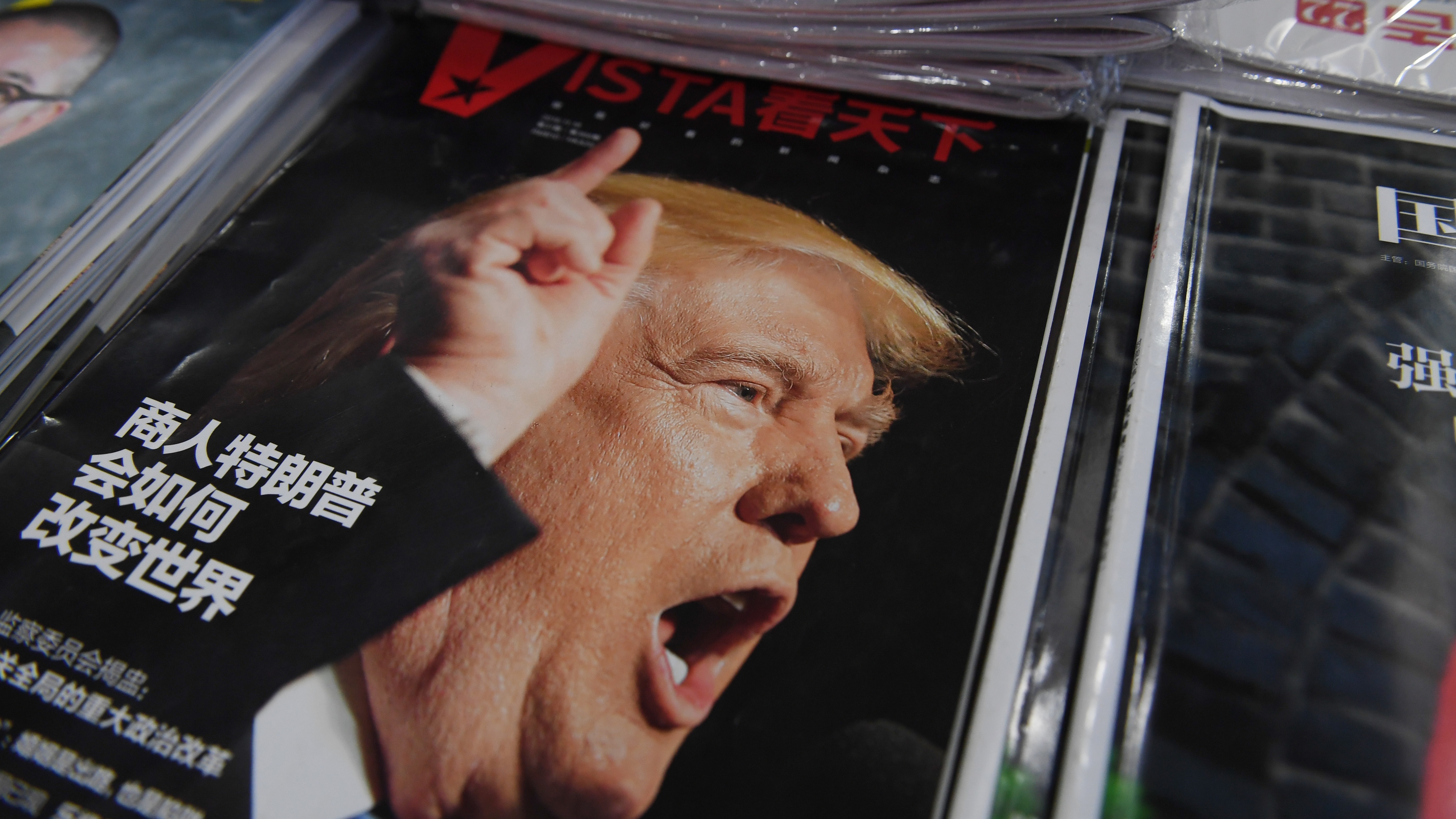 A magazine featuring U.S. President-elect Donald Trump is seen at a bookstore in Beijing on Monday. The headline reads, &quot;How will businessman Trump change the world?&quot; Beijing is &quot;seriously concerned&quot; by Trump's suggestion that he could drop Washington's &quot;One China&quot; policy, officials said Monday. (AFP/Getty Images)