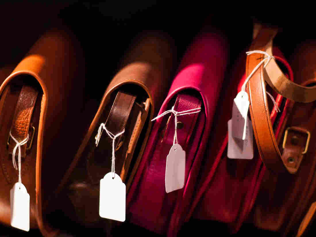 Close-Up Of Purses For Sale In Shop