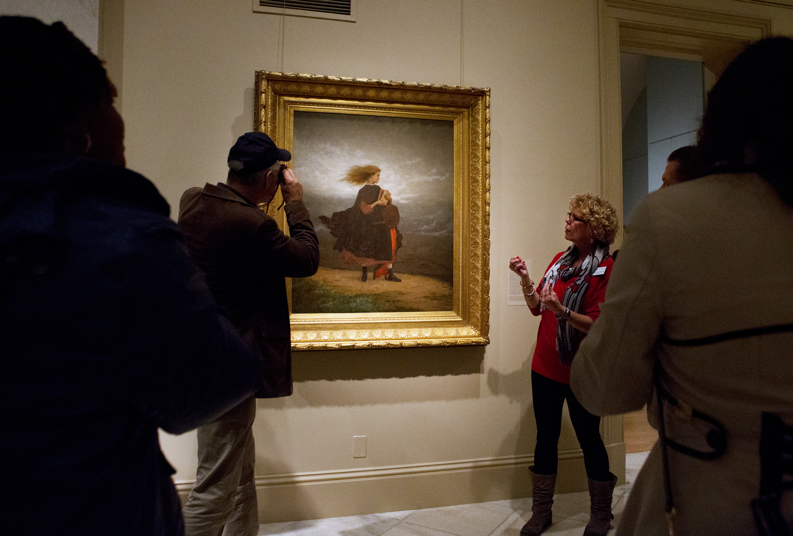 At the Smithsonian American Art Museum, specially trained docents lead twice-a-month tours for blind and visually impaired art lovers. (Above) Betsy Hennigan describes a painting to visitors on an America InSight tour. (NPR)