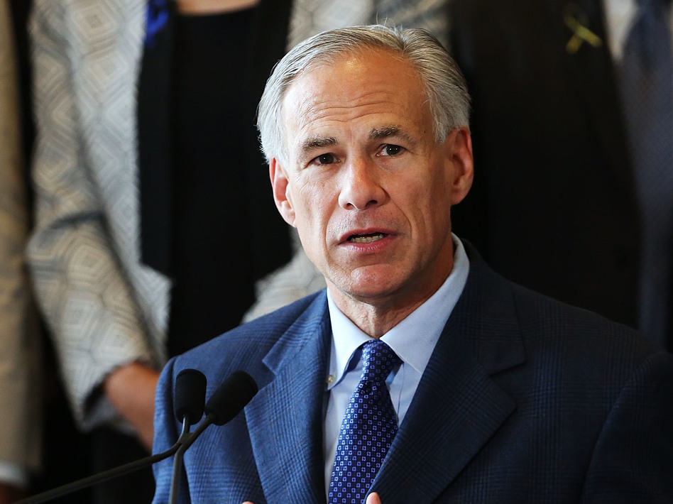 Texas Gov. Greg Abbott at Dallas' City Hall in July. Abbott has strongly endorsed new rules that would require removed fetal tissue to be buried or cremated. (Spencer Platt/Getty Images)