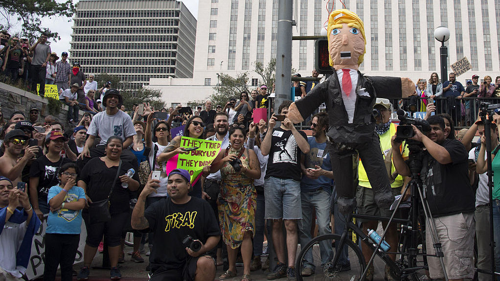 A protest against President-elect Donald Trump in Los Angeles last month. Democrat Hillary Clinton drew 61 percent of the vote versus Trump's 31 percent in the country's most populous state. (Getty Images)