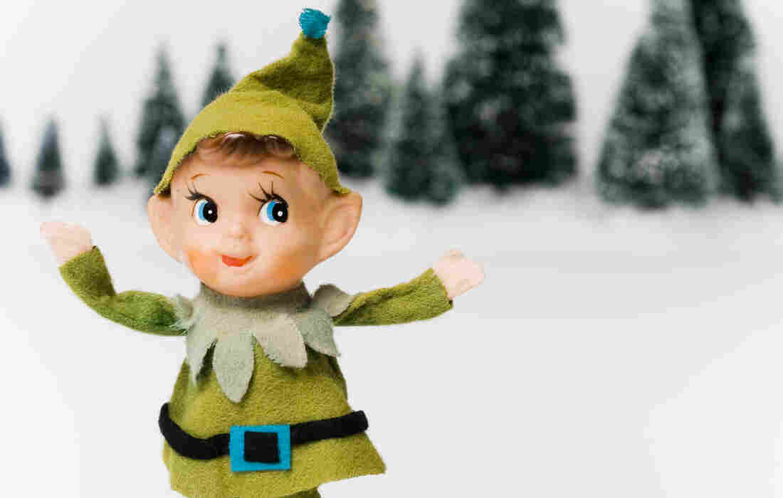 An elf with snow and trees