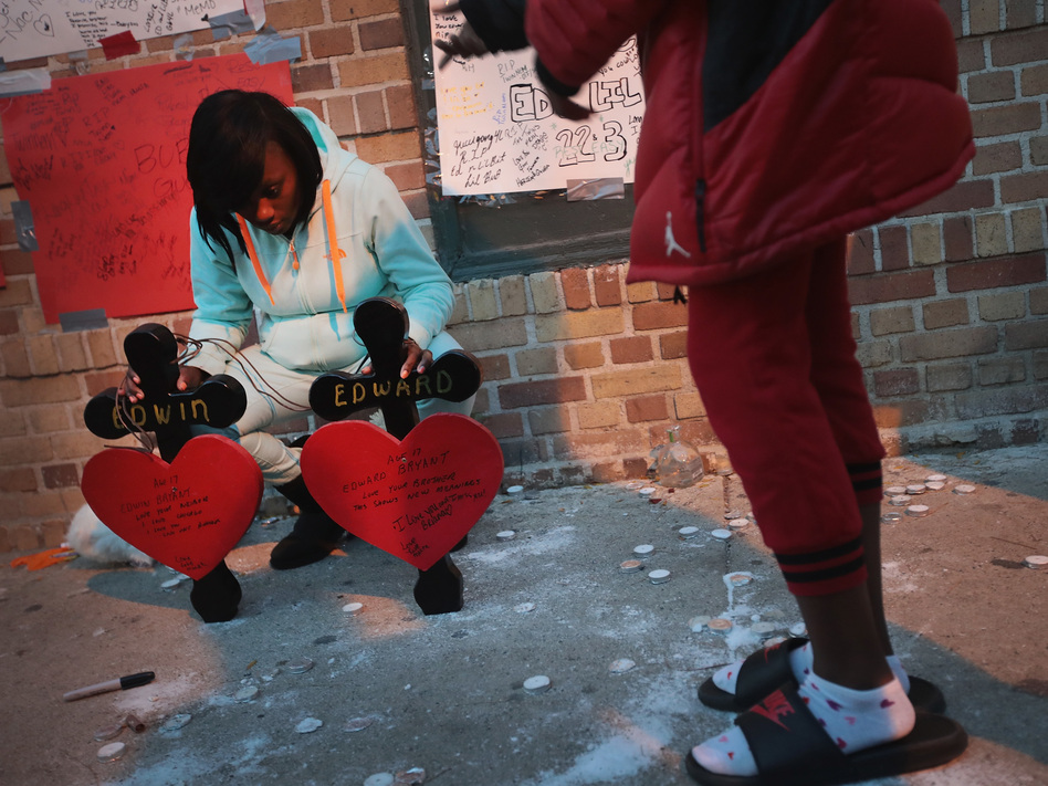 Friends and family members attend a memorial service for 17-year-old twin brothers Edward and Edwin Bryant who were shot and killed in October. Chicago has logged more than 700 homicides this year, more than any other major U.S. City (Scott Olson/Getty Images)