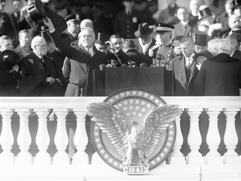 President Franklin Delano Roosevelt waves from the inaugural stand on Capitol Hill in Washington on Jan. 20, 1941. (AP)