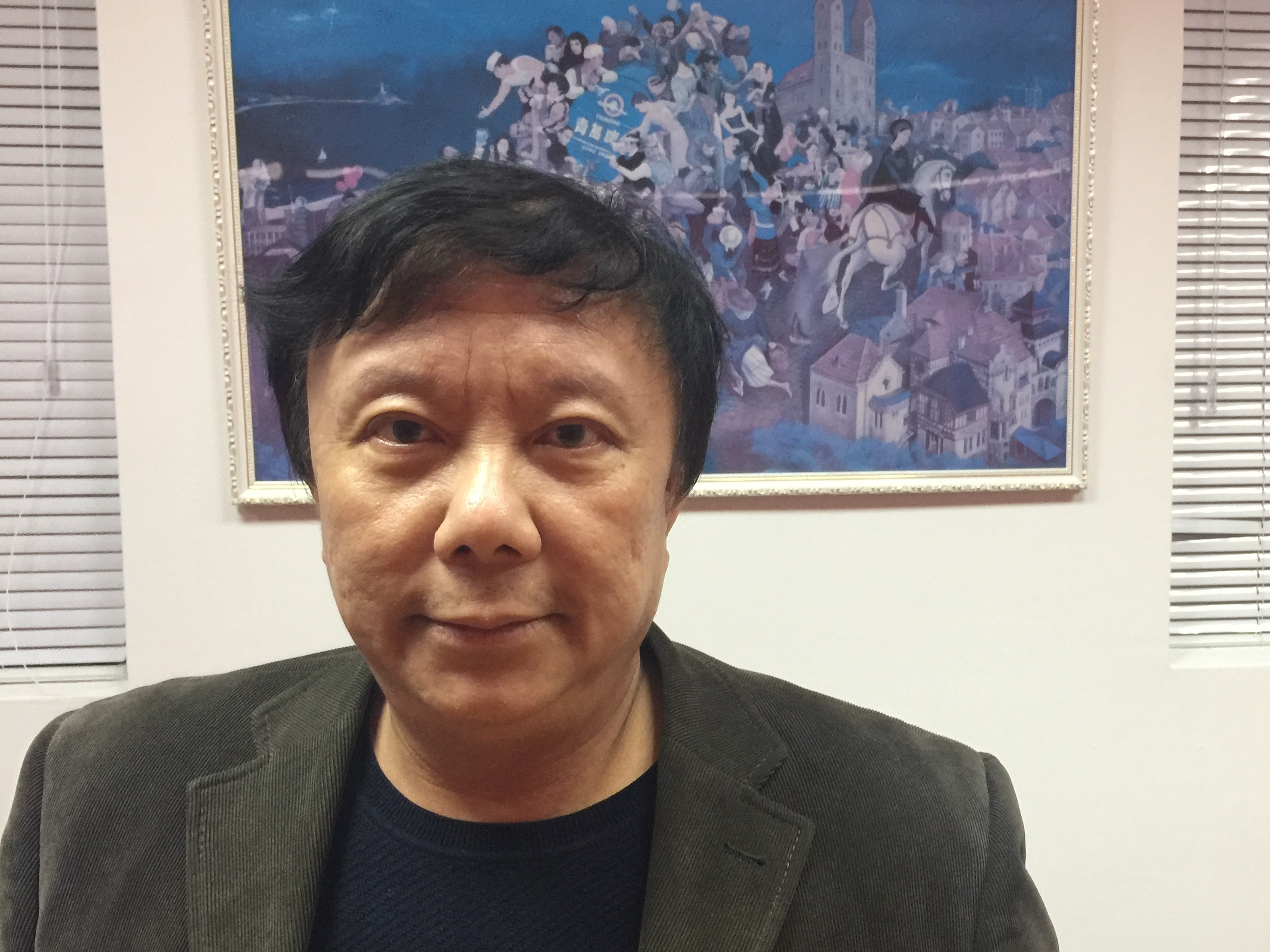 Zhu Dake is a professor at Tongji University in Shanghai. He says the Honest Shanghai app would be better if citizens could rate their own government. Rob Schmitz/NPR.