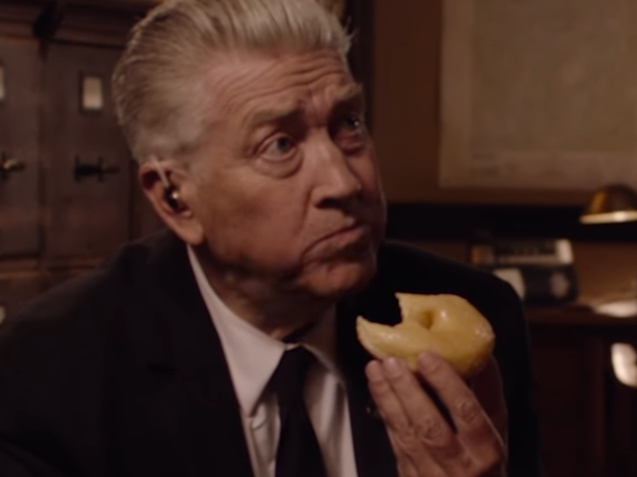 David Lynch eats a donut in Showtime's bare-bones teaser for the <em>Twin Peaks</em> revival. (Screenshot by NPR)