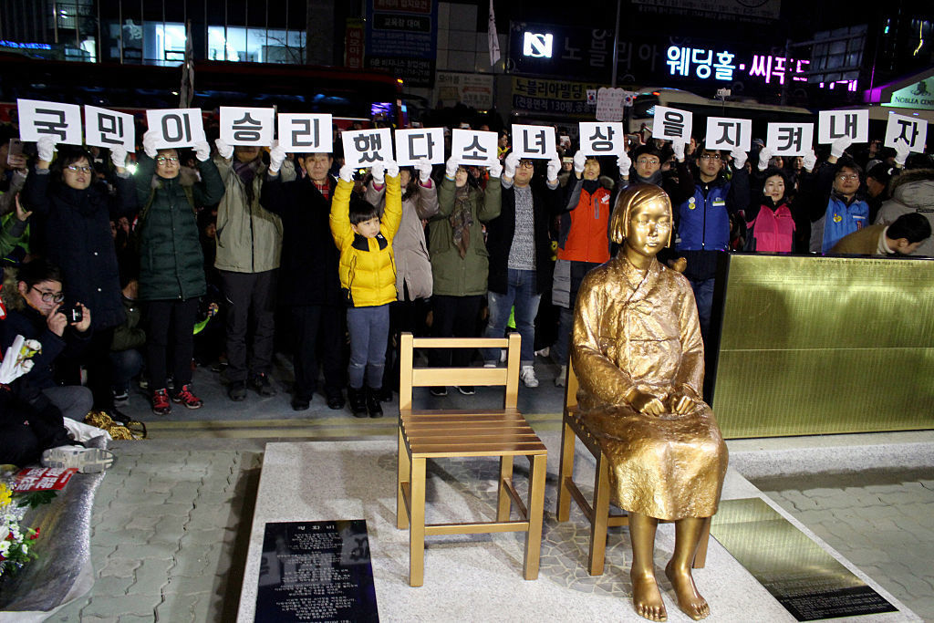 A statue of a girl symbolizing Korean &quot;comfort women&quot; is unveiled last week during a ceremony in front of the Japanese Consulate in Busan, South Korea. (The Asahi Shimbun/Getty Images)