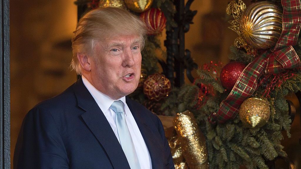 President-elect Donald Trump talks with reporters between meetings last month at his Mar-a-Lago club in Palm Beach, Fla. (AFP/Getty Images)