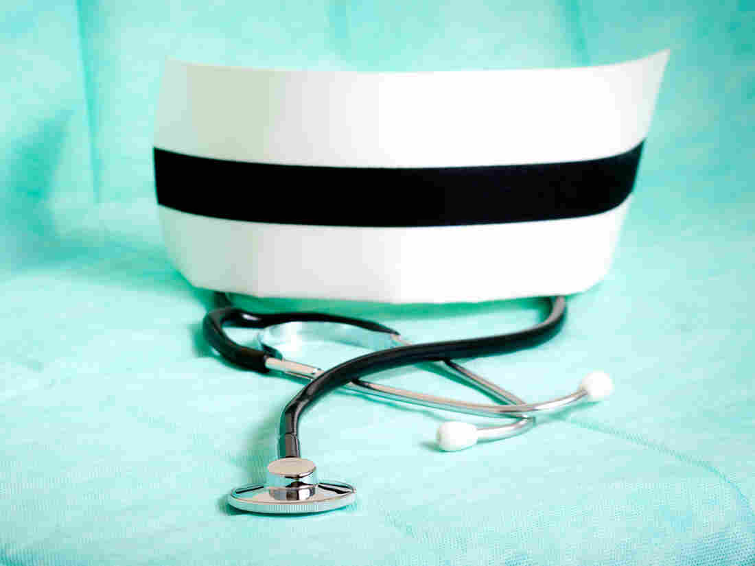 Nurse's cap and stethoscope.