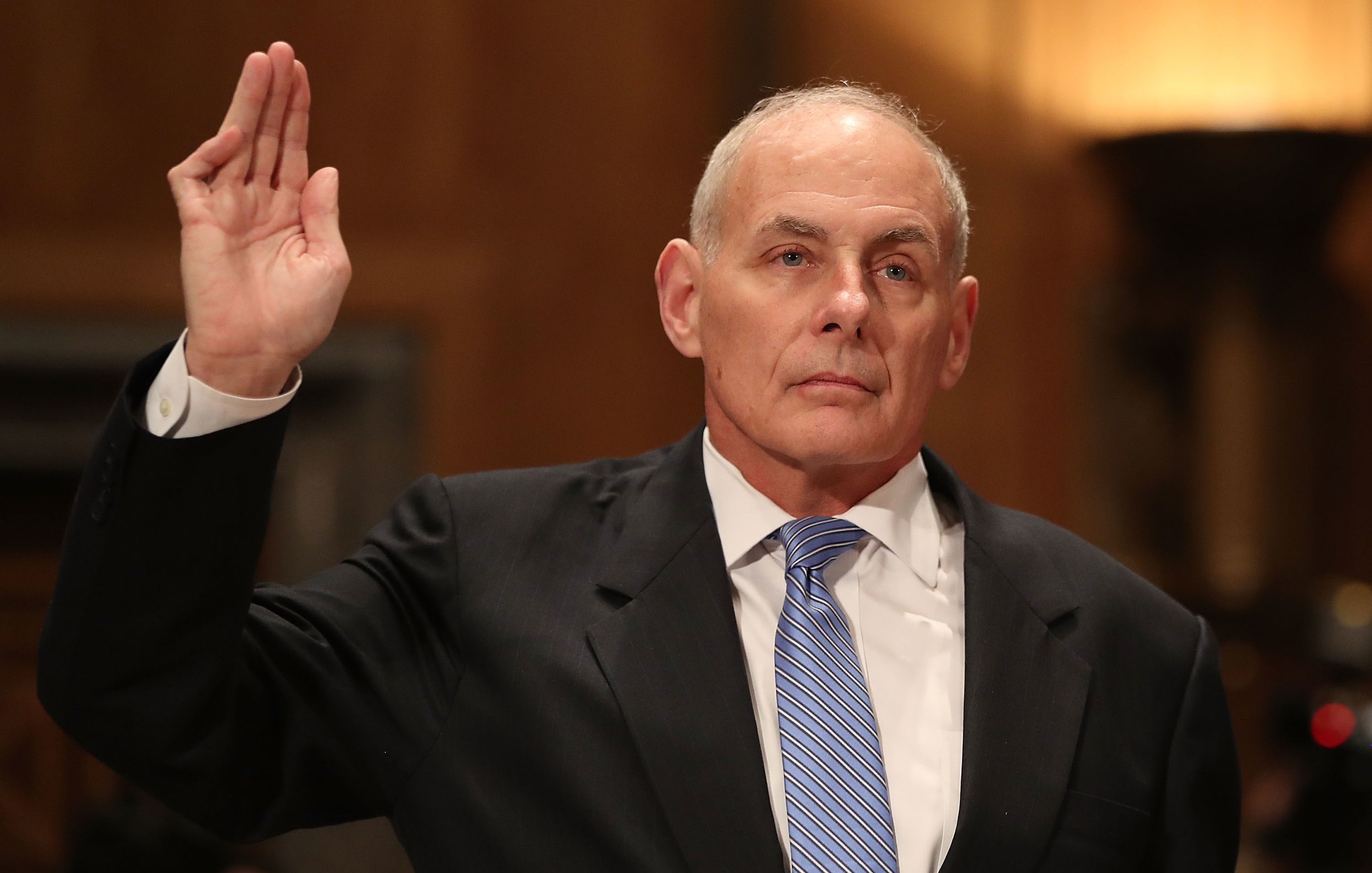 Retired Marine Gen. John Kelly is sworn in before his confirmation hearing in front of the Senate Homeland Security and Governmental Affairs Committee to run the Department of Homeland Security on Tuesday. (Getty Images)