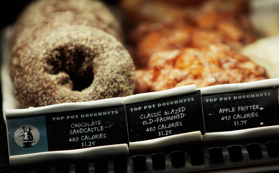 Most restaurants are required to post calorie counts on menus as a result of the Affordable Care Act. The question is whether they help you resist that doughnut. (Chris Hondros/Getty Images)