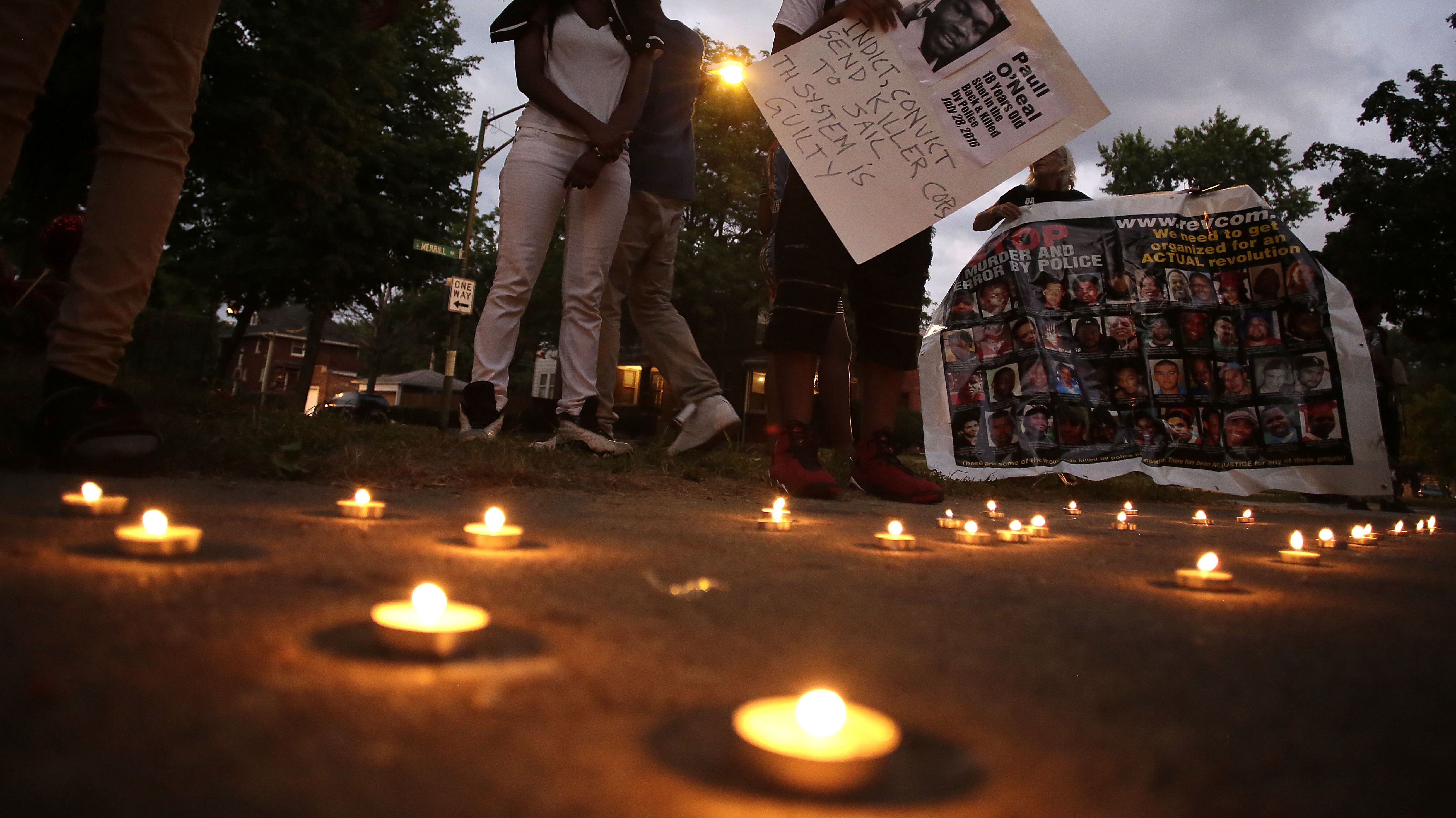 Friends of Paul O'Neal attend a vigil to remember him on Aug. 5, 2016, in Chicago. O'Neal, an unarmed 18-year-old man, was shot and fatally wounded the month before when Chicago police officers tried to arrest him for allegedly stealing a car from the suburbs. (Getty Images)