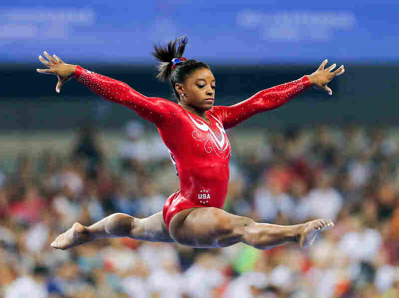 Simone Biles performs on the balance beam at the 45th Artistic Gymnastics World Championships in Nanning, China in October 2014.