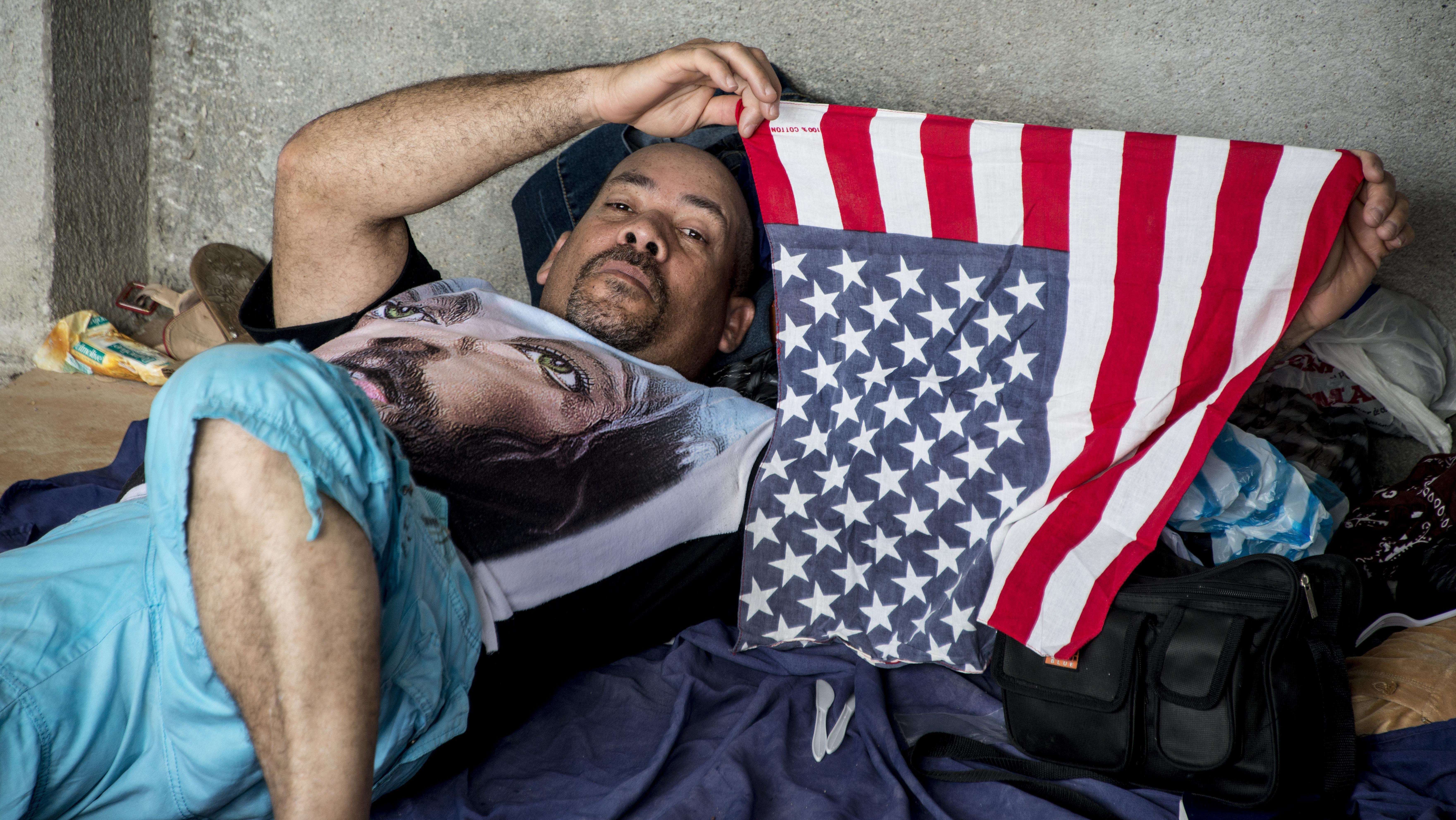 A Cuban migrant bound for the U.S. by way of Central America rests in a shelter in Costa Rica in November 2015. Until President Obama ended the so-called wet-foot, dry-foot policy on Thursday, Cubans who reached U.S. soil either by sea or land were allowed to stay and seek permanent residency. (AFP/Getty Images)