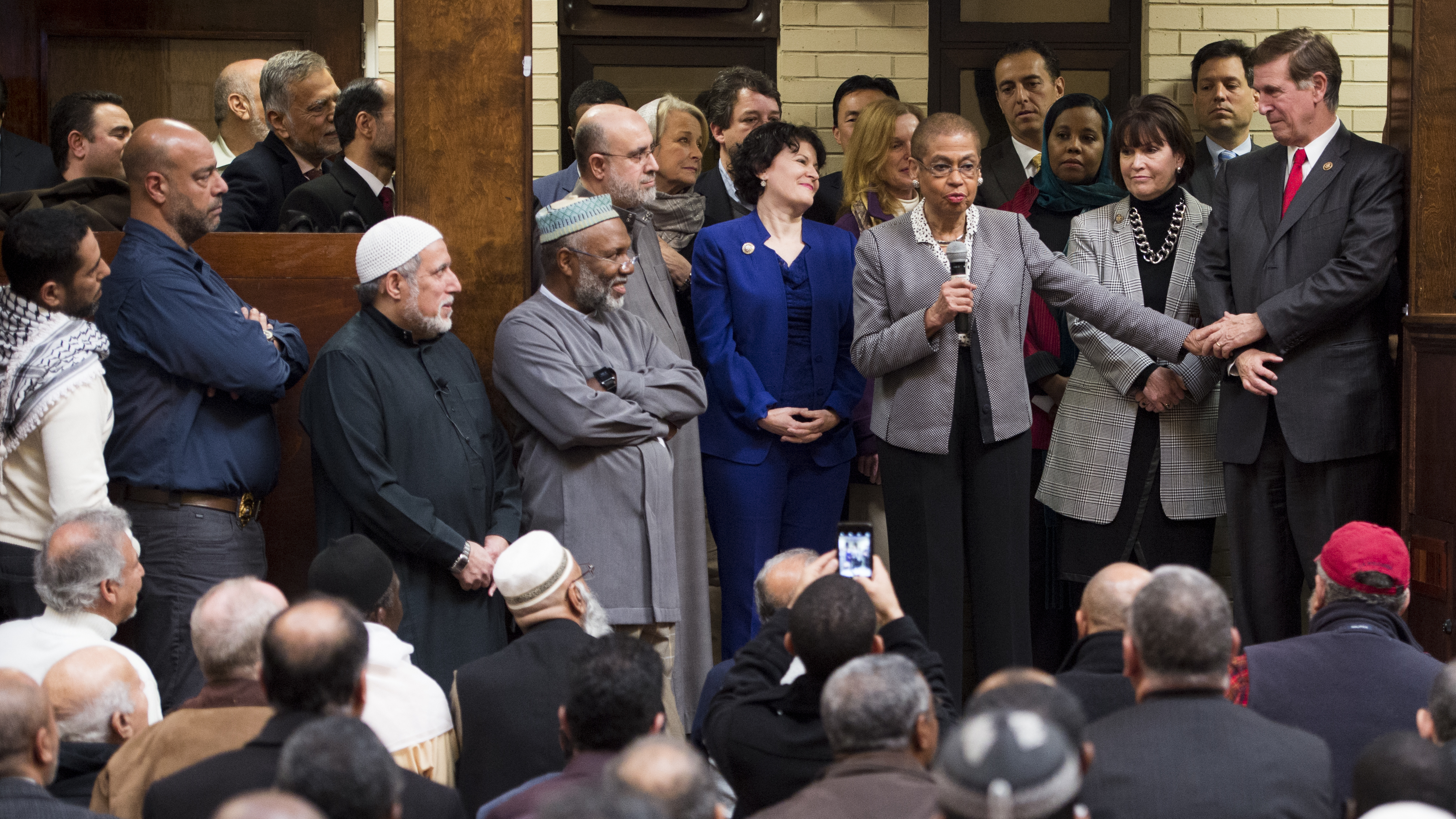 Democratic members of Congress address the worshipers at the Dar al-Hijrah Islamic Center after Friday prayers on Dec. 4 in Falls Church, Va. (CQ Roll Calll)