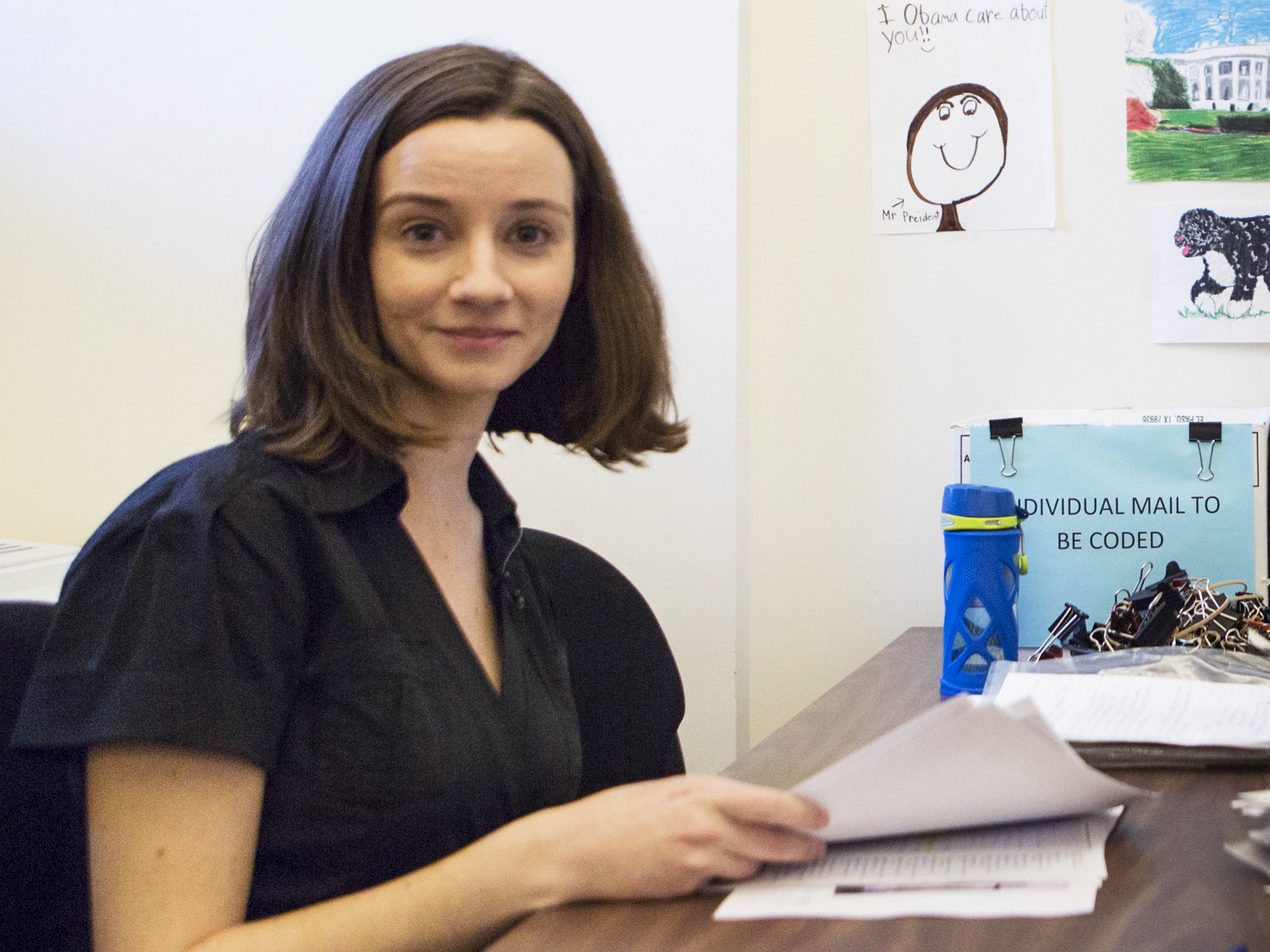 Fiona Reeves, director of Presidential Correspondence at the White House, sorts through mail in the kids mail room at the Eisenhower Executive Office Building in Washington, D.C. (Becky Harlan/NPR)