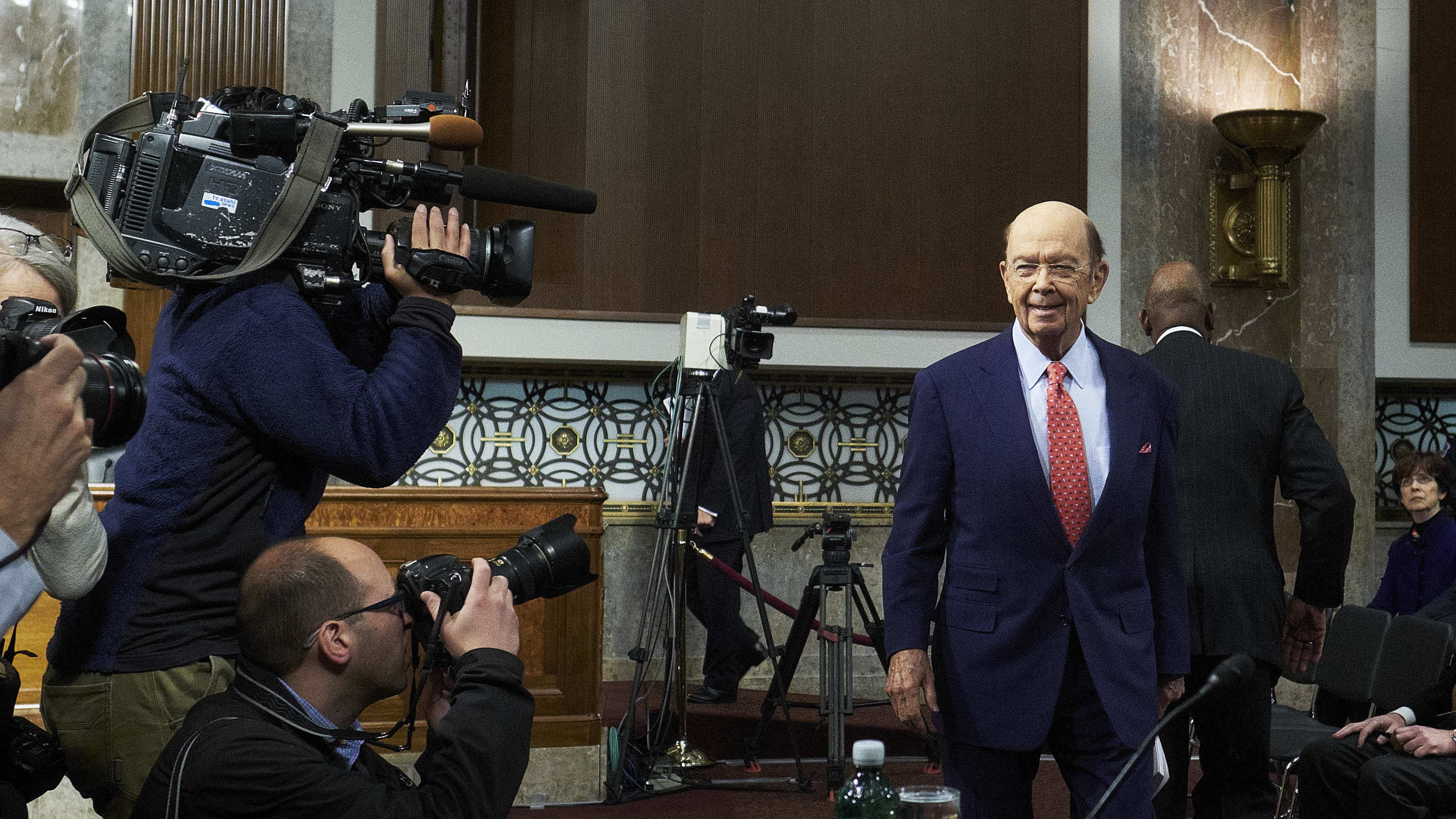 Billionaire investor Wilbur Ross, Commerce Secretary nominee for U.S. President-elect Donald Trump, arrives Wednesday for his Senate confirmation hearing. Ross is warning America's trading partners to practice &quot;fair trade&quot; and cut state control over business if they want access to the world's biggest economy. (Bloomberg via Getty Images)