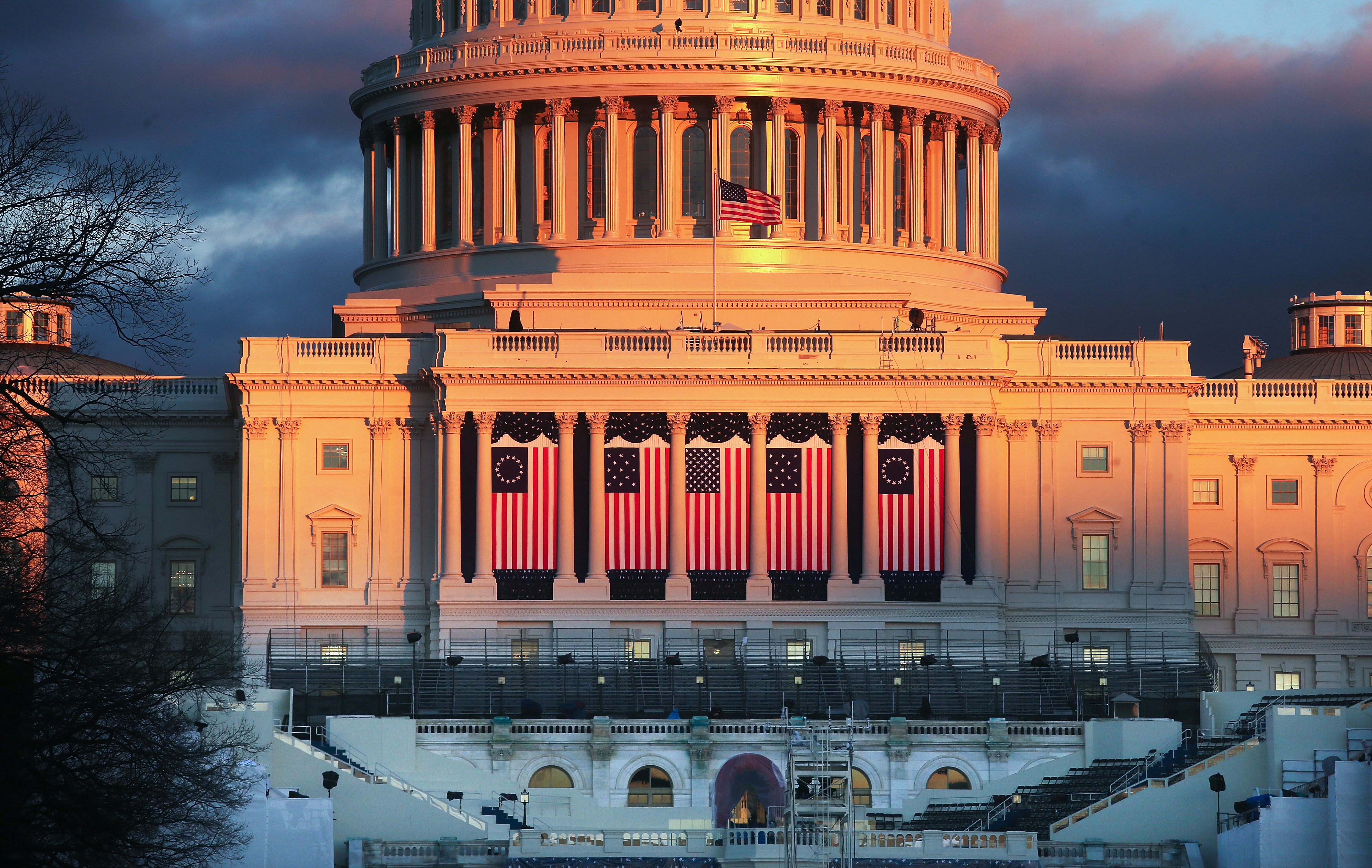 The sun sets on the west front of the U.S. Capitol building ahead of inauguration ceremonies for President-elect Donald Trump on Wednesday.