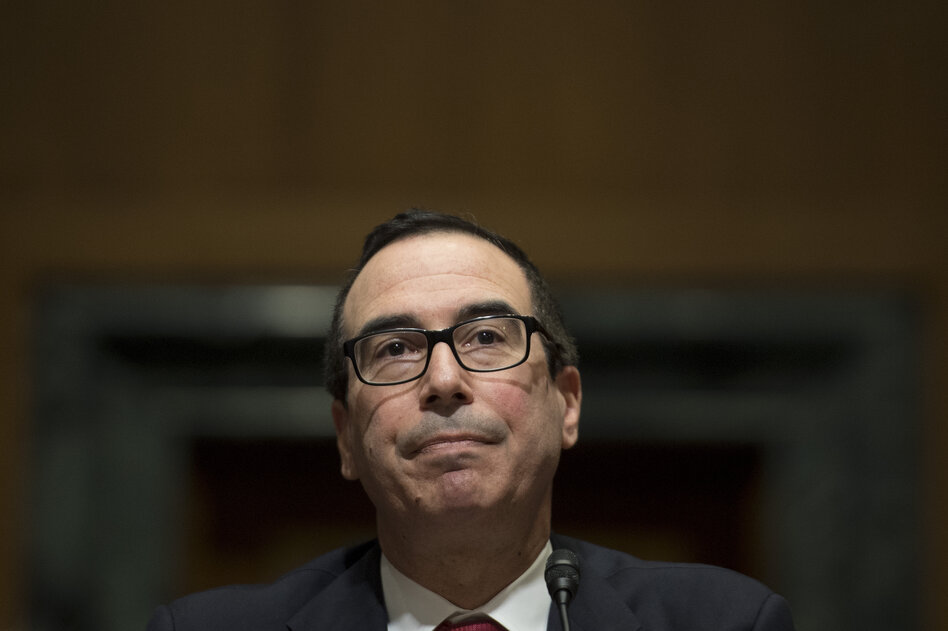 Steven Mnuchin testifies before Senate Finance Committee on Capitol Hill on Thursday, for his nomination to be secretary of the Treasury in the Trump administration. (Jim Watson/AFP/Getty Images)