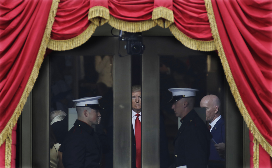 President-elect Donald Trump waits to step out onto the portico at the West Front of the U.S. Capitol for his inauguration. (Patrick Semansky/AP)