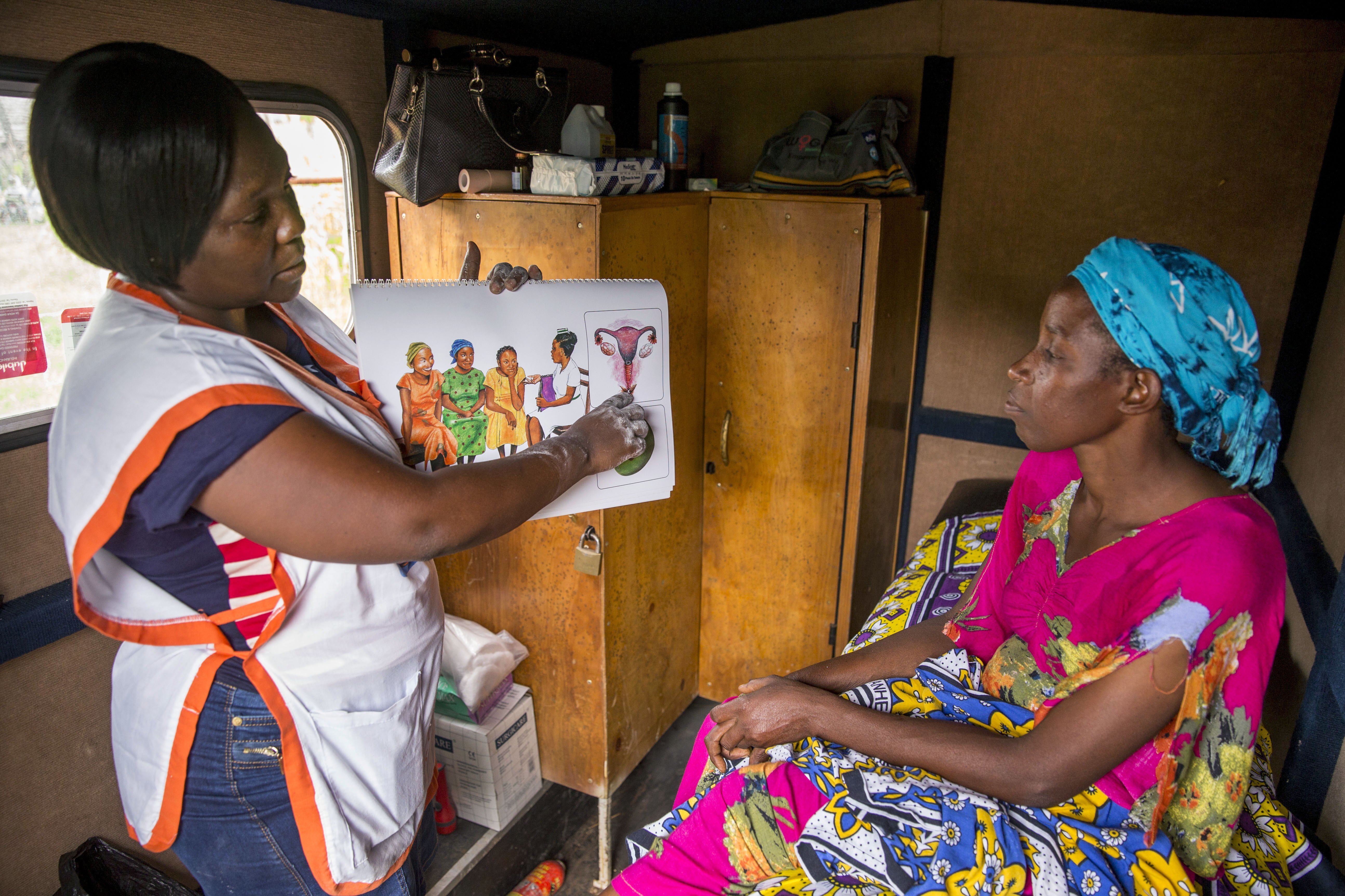A mobile clinic outside Mombassa, Kenya, provides women in rural areas with family planning options like contraceptive implants and offers cervical cancer screening as well. (Getty Images)