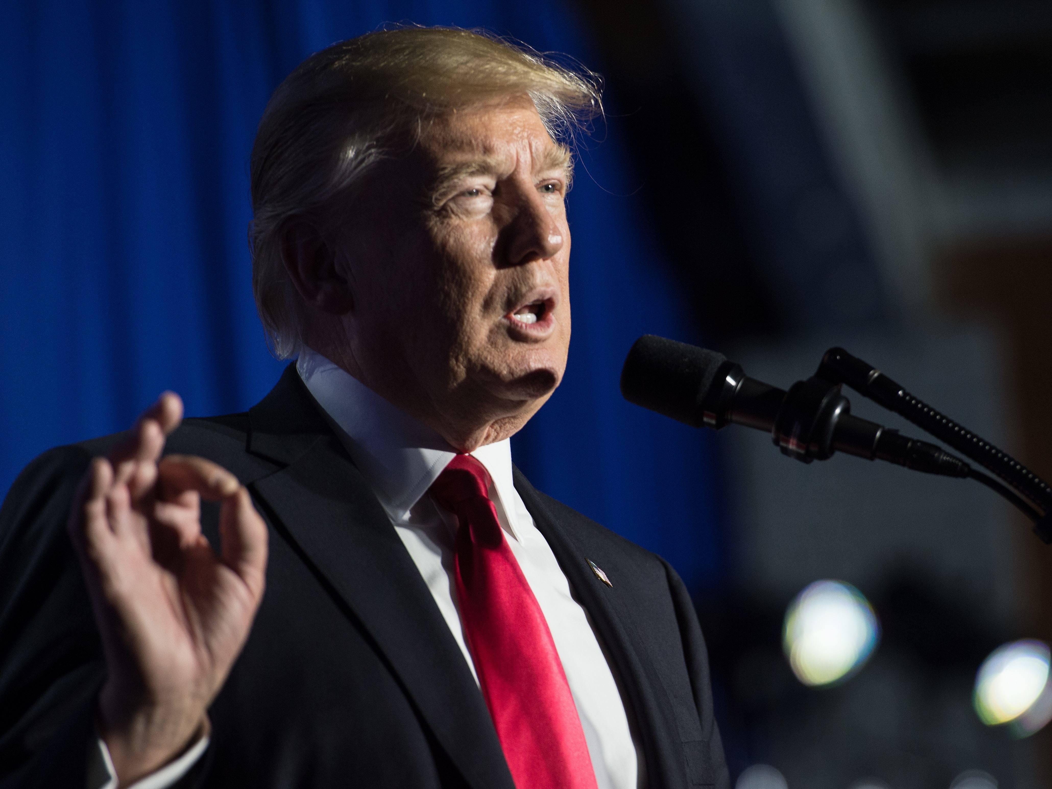 Many groups are raising questions about President Trump's conflicts of interest, but do they have the &quot;standing&quot; to challenge him in court? (AFP/Getty Images)