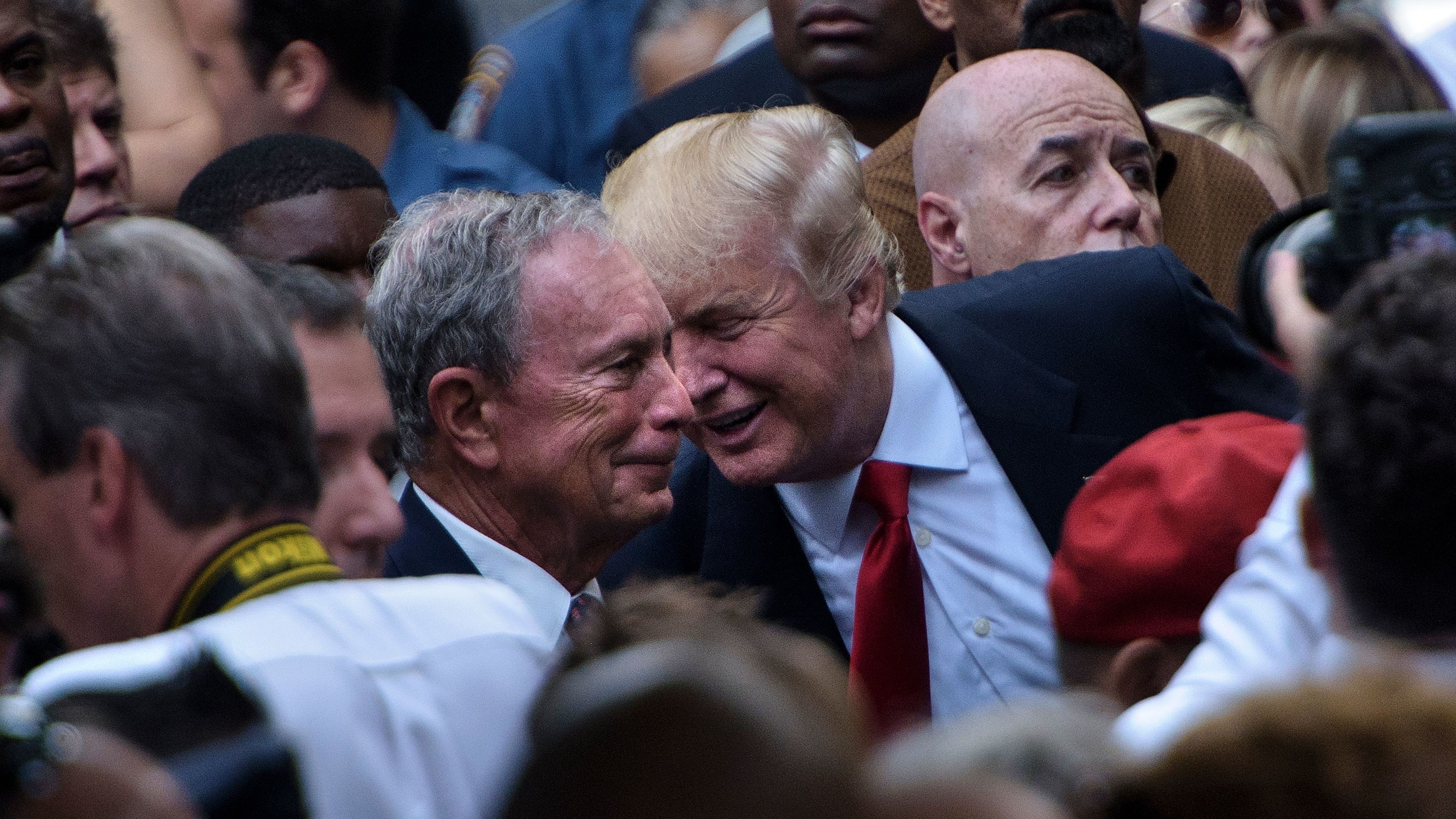 President Trump and former New York City Mayor Michael Bloomberg, seen here at the National 9/11 Memorial on Sept. 11, 2016, have taken similar actions regarding their wealth and holding office.