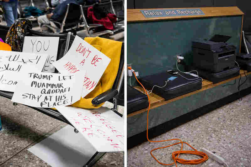 Handmade signs and temporary workstations are sprinkled throughout the international arrivals gate at Washington Dulles International Airport in D.C.