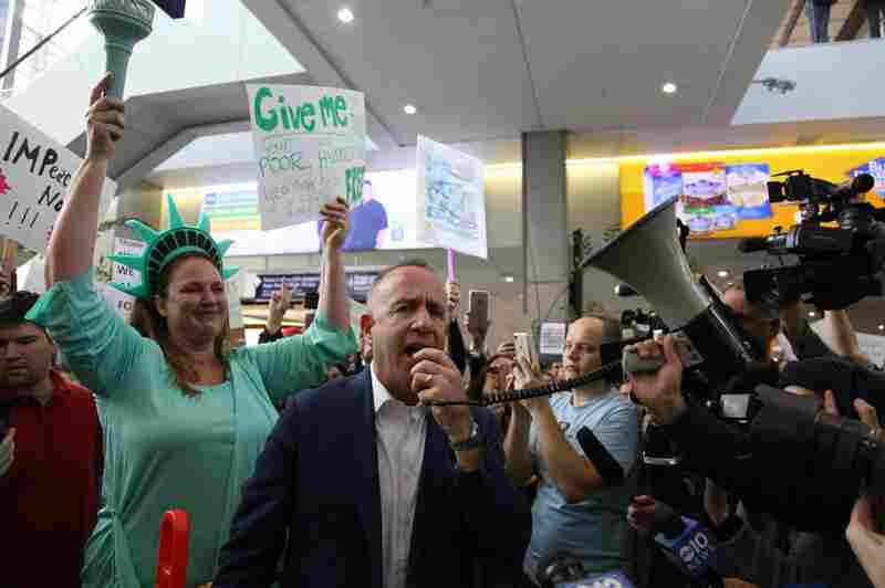 Sacramento Mayor Darrell Steinberg addresses protesters in Terminal B of the Sacramento International Airport in California.