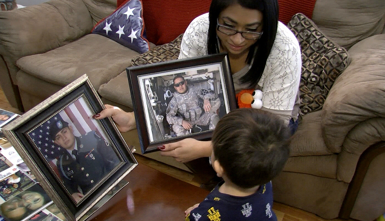 Widowed while pregnant with their second son, Gloria Grijalva shares pictures of her husband, U.S. Army veteran Charlie Grijalva, who committed suicide in December 2014. (KPBS)