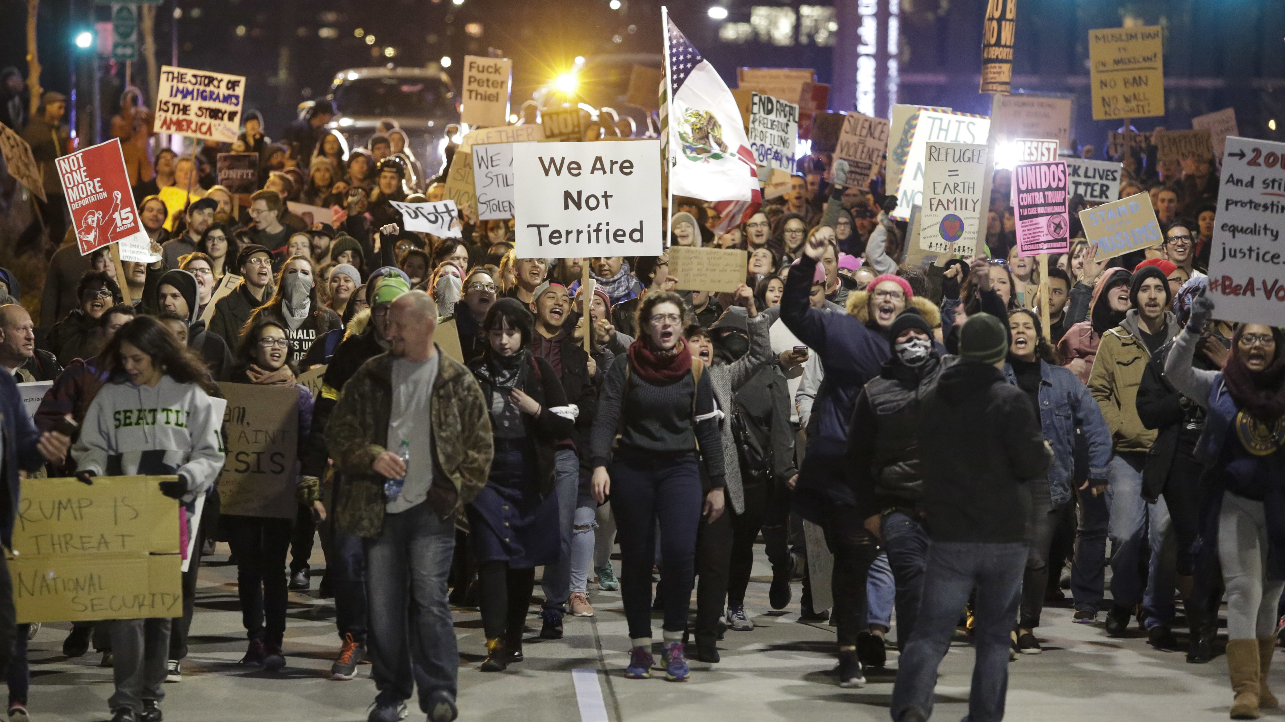 Washington state has filed a lawsuit seeking to block President Trump's order on immigration from Muslim-majority countries. The ban prompted protests over the weekend in Seattle and other cities. (AFP/Getty Images)