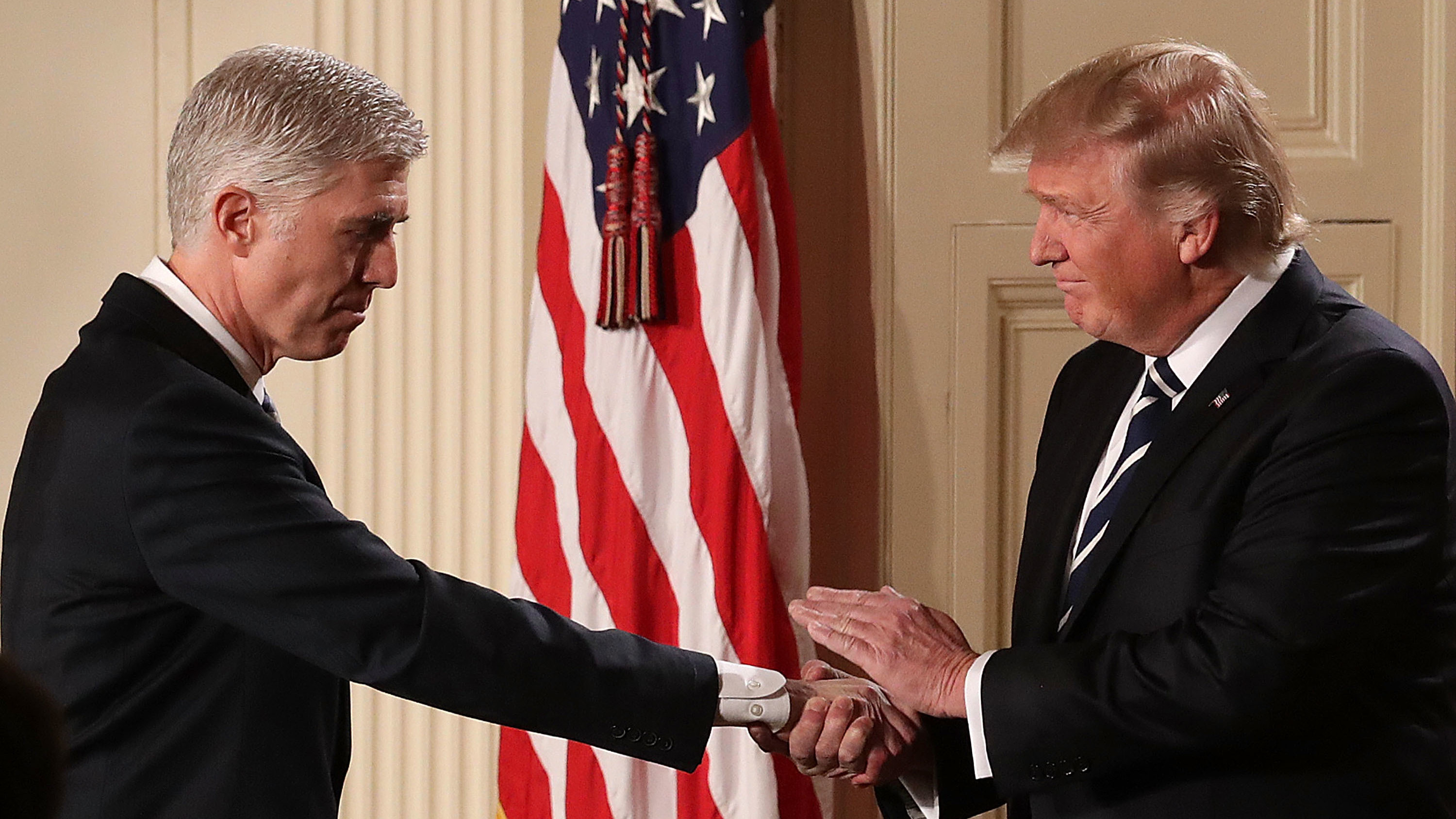 President Trump shakes hands with Judge Neil Gorsuch after nominating him to the U.S. Supreme Court during a ceremony in the East Room of the White House on Tuesday. (Getty Images)