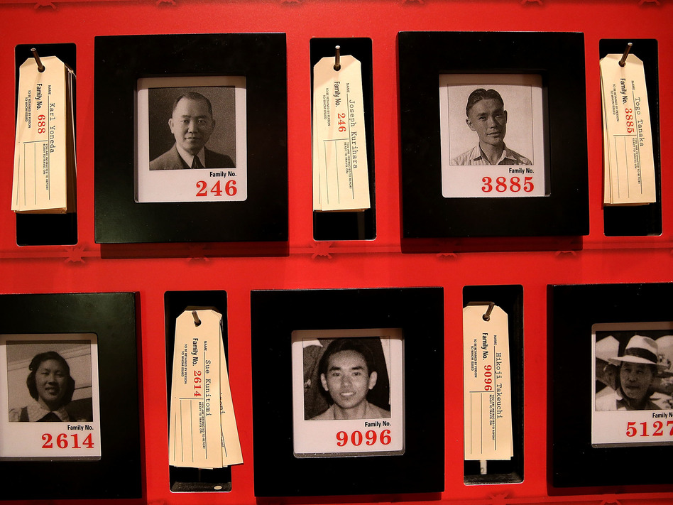 Pictures of people who were incarcerated at Manzanar War Relocation Center are displayed alongside family tags at Manzanar National Historic Site near Independence, Calif., in 2015. (Justin Sullivan/Getty Images)