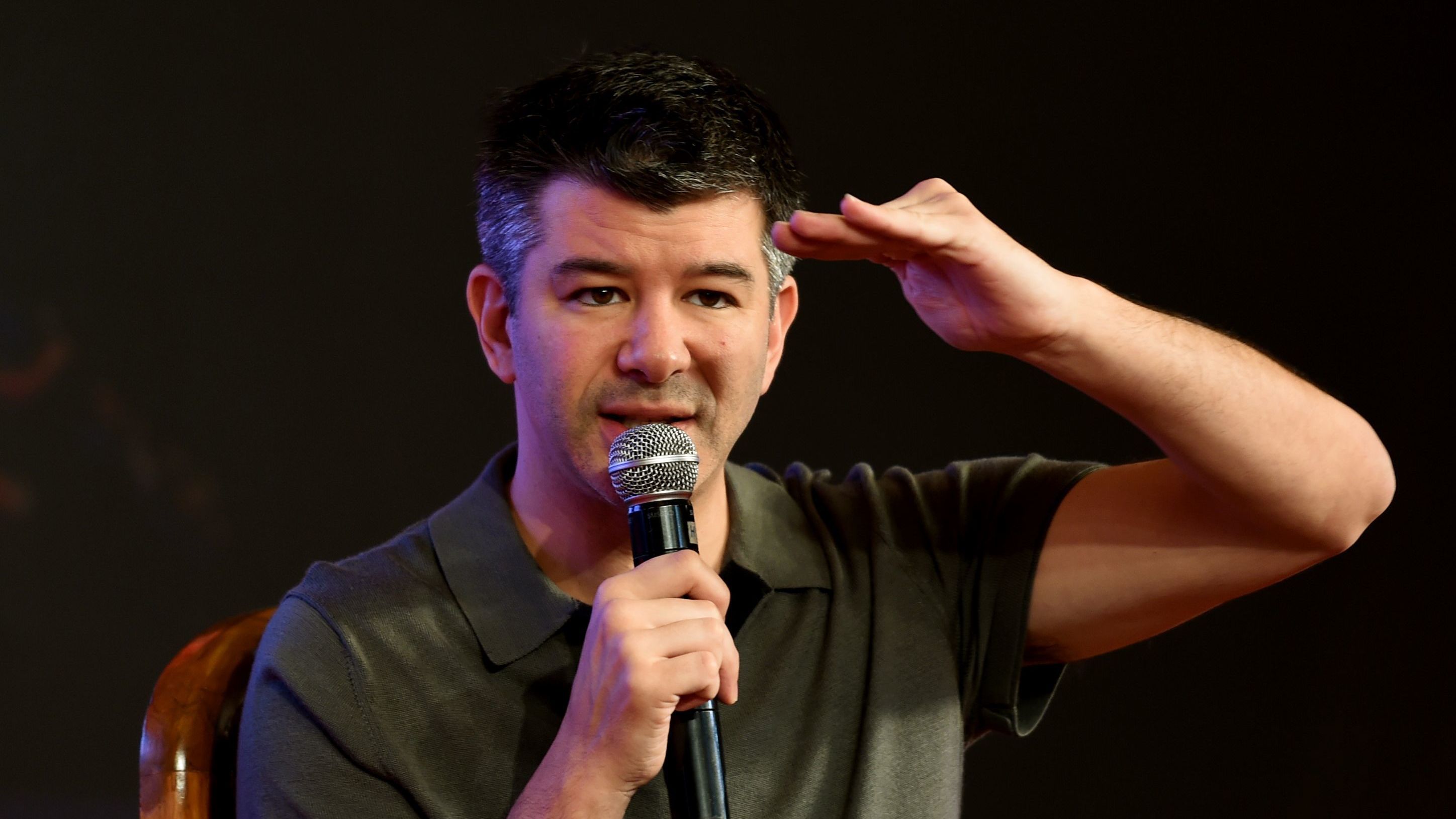 Uber CEO leaves business council after criticism from Trump opponents